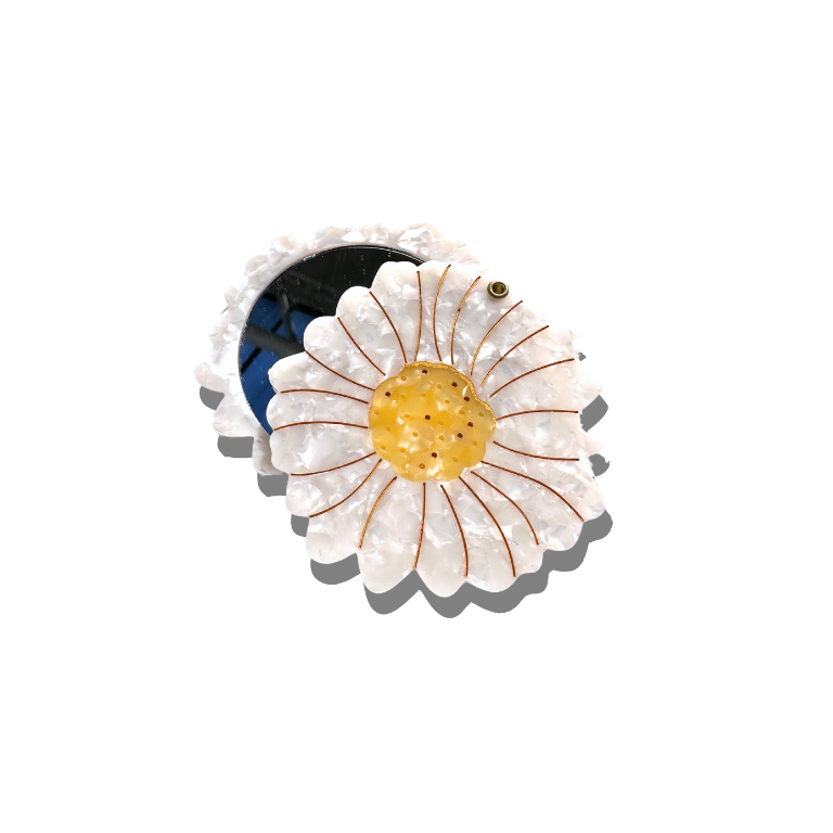 A daisy flower-shaped brooch with white textured petals, a yellow center, and brown radiating lines, shown on a plain white background.