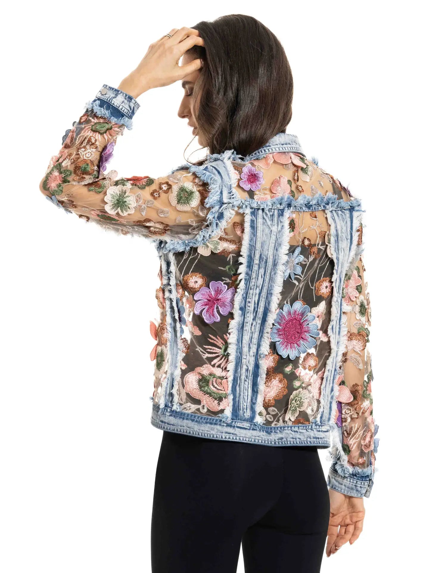A denim and lace embroidered jacket by ADORE featuring intricate embroidery and a stylish, fitted design.