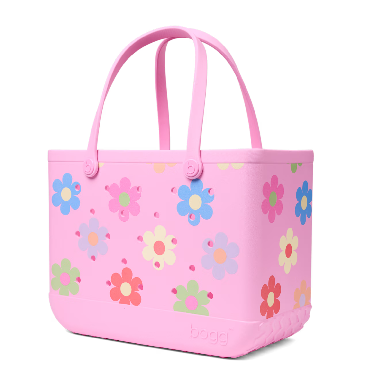 Bogg Bag tote in bright pink with sturdy handles, spacious interior, and durable plastic material suitable for casual outings