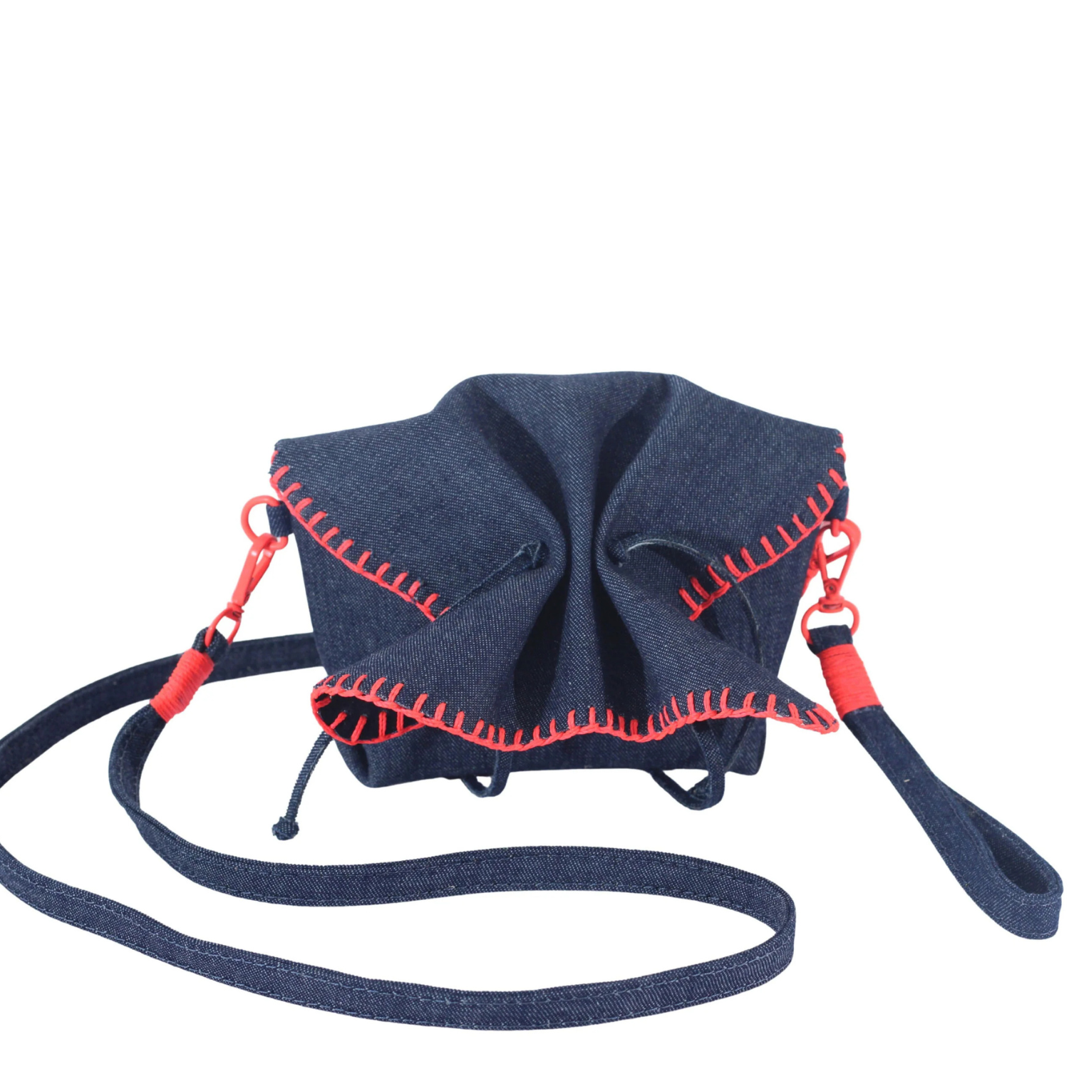 Carlos Falchi mini butterfly crossbody bag with colorful butterfly print and adjustable strap on a neutral background.