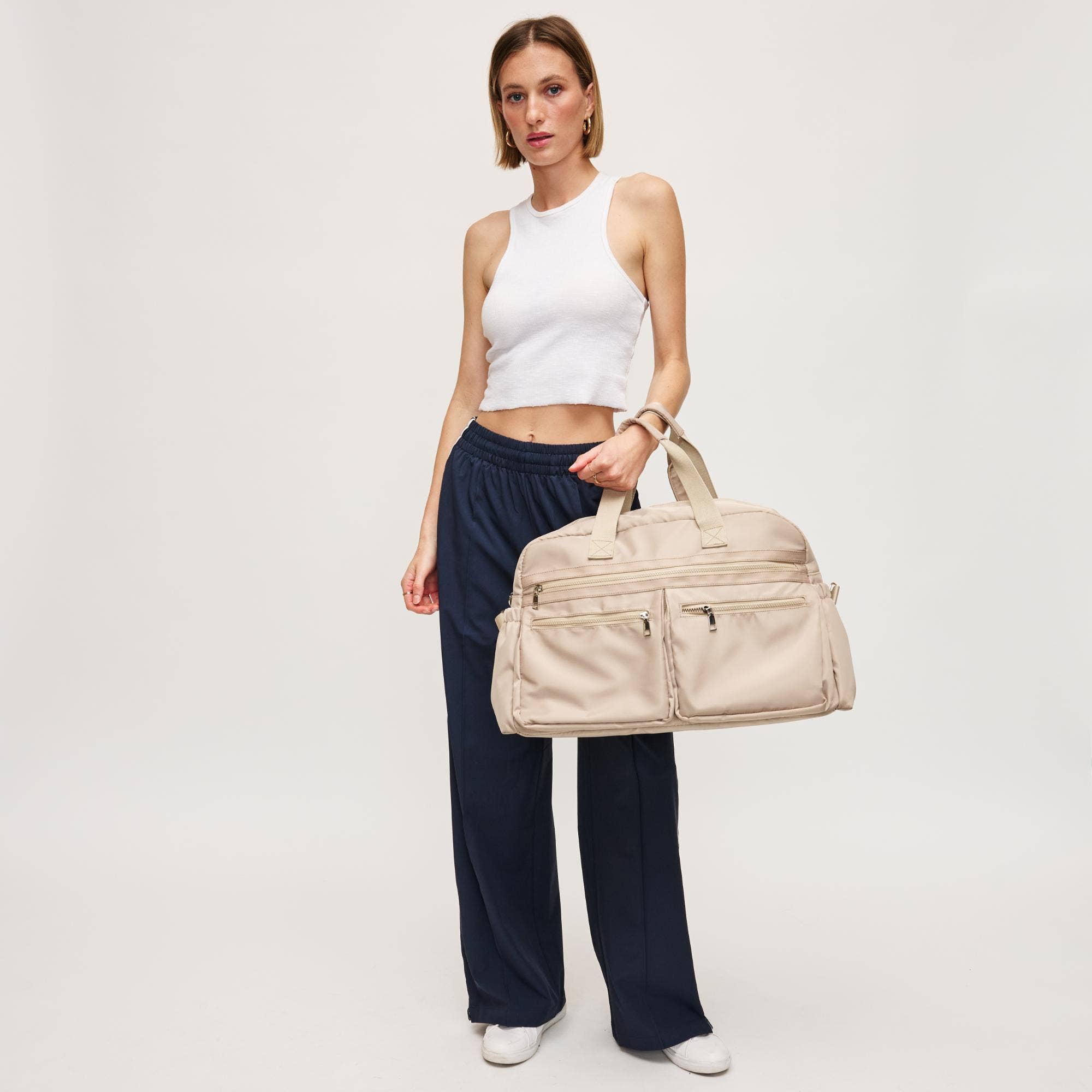 Urban Expressions Navigator Multi Compartment Weekender in a stylish design with multiple compartments for organization.