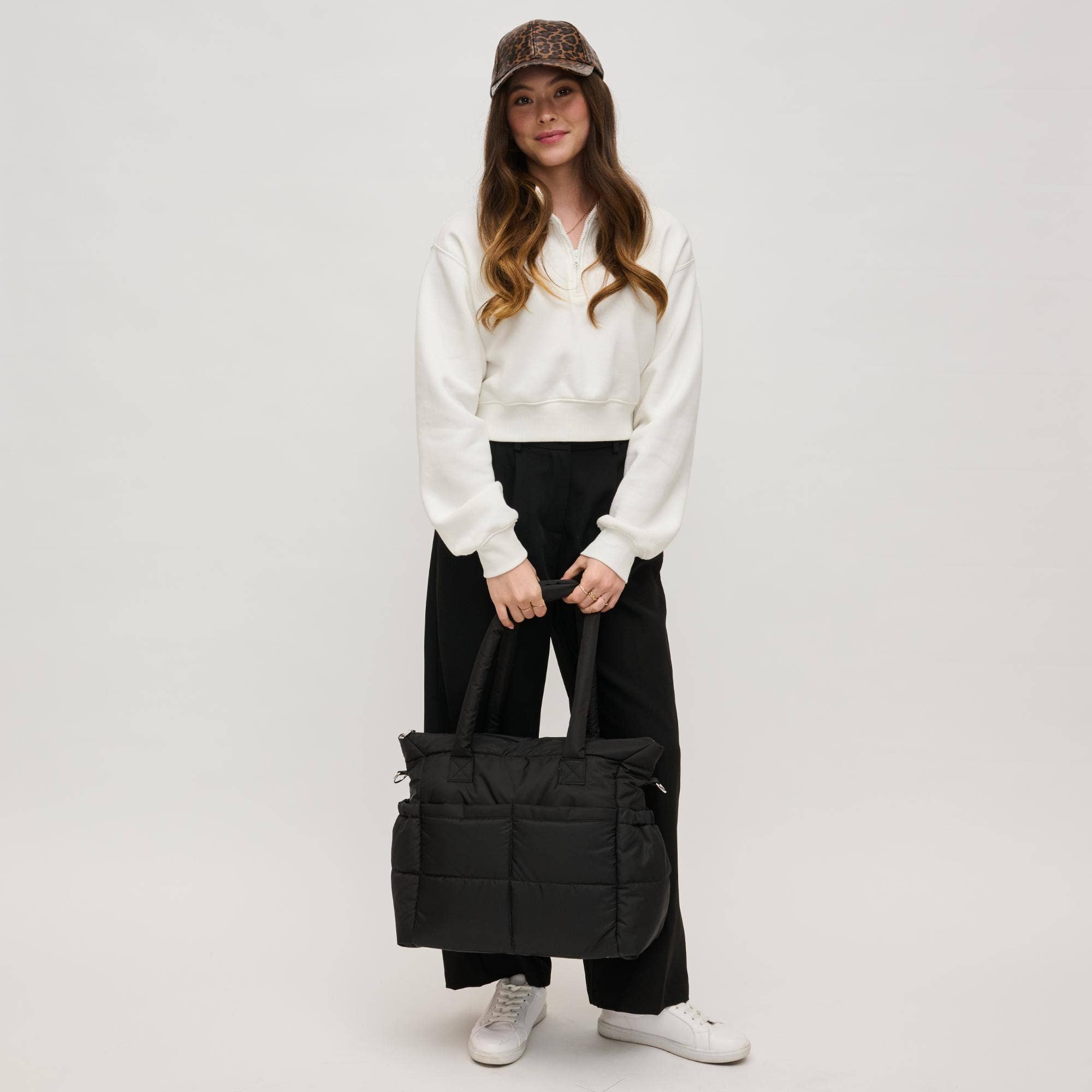Urban Expressions Jetsetter Multi Compartment Travel Tote in stylish design, showcasing multiple compartments and durable material.