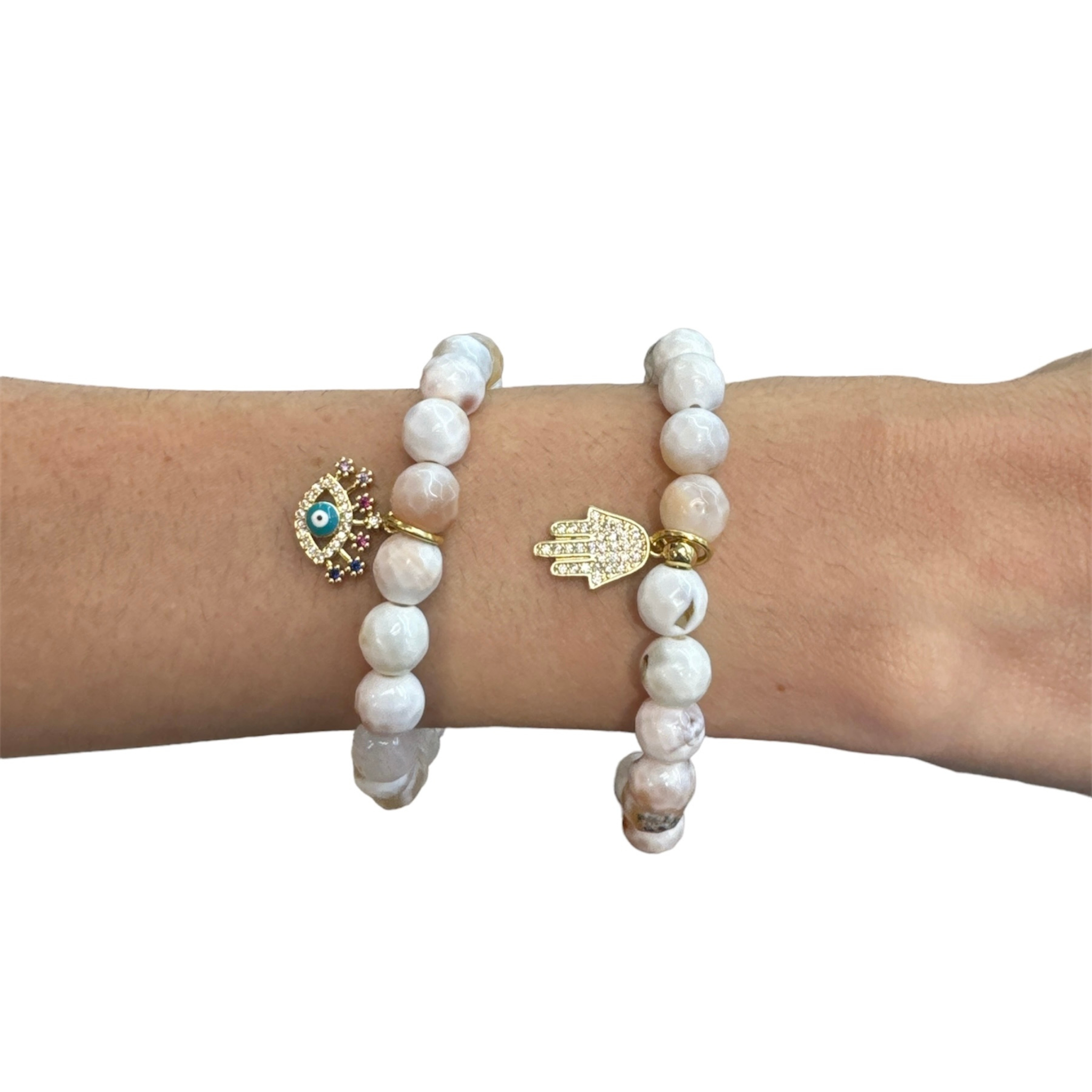 White beaded bracelet w charms stack