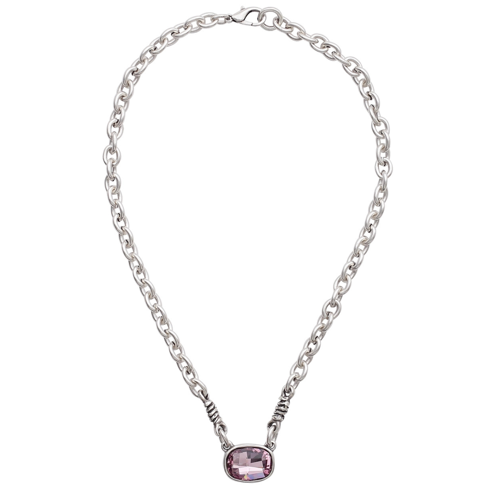 Handmade pink crystal pewter necklace by Chanour featuring a delicate pink crystal pendant on a silver chain.