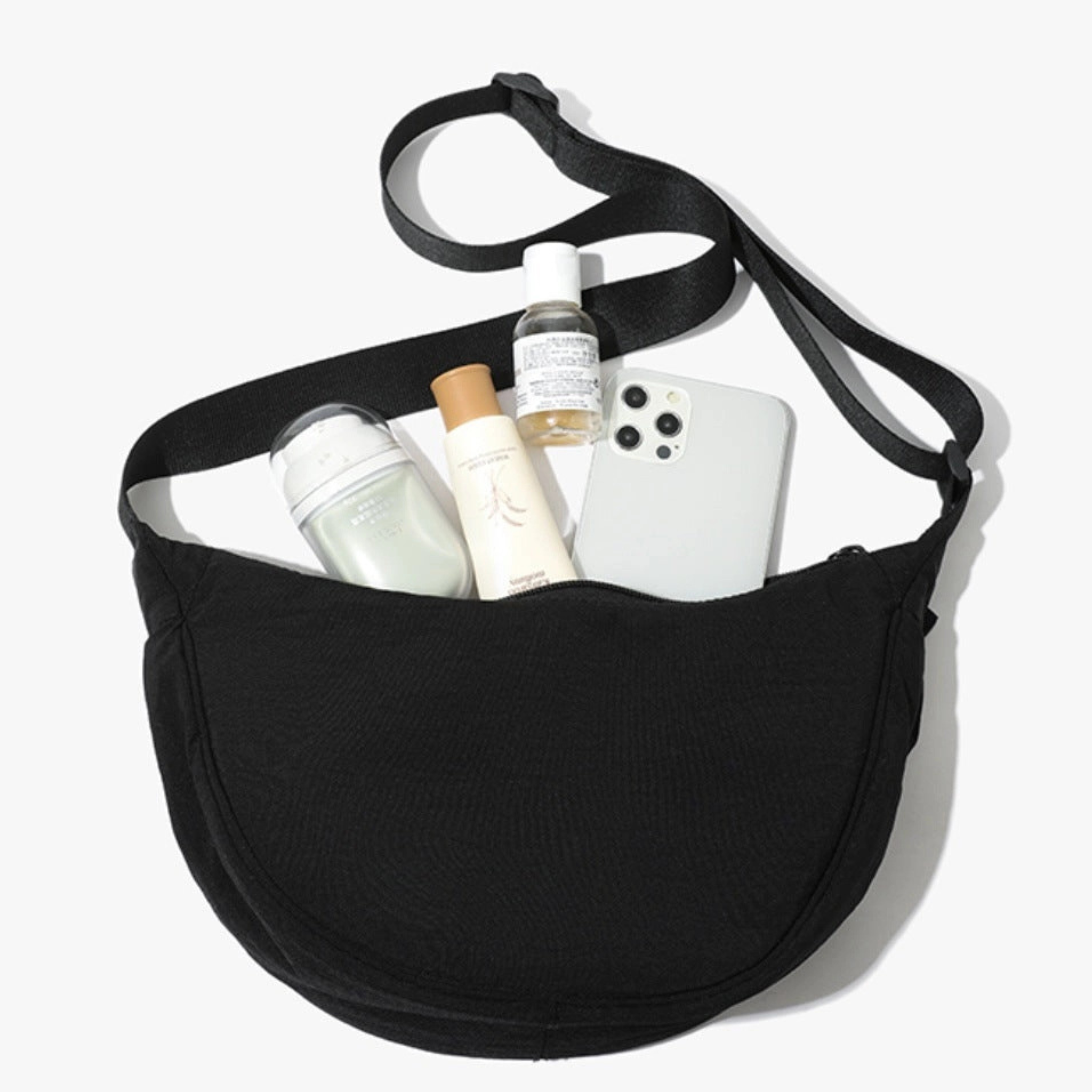 Solid color nylon shoulder bag from Private Label, portable handbag with a sleek design and adjustable strap.