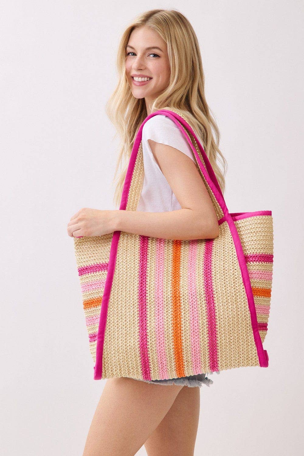 Multi-color Jennifer straw beach tote bag with woven design, spacious for beach essentials, by Private Label.