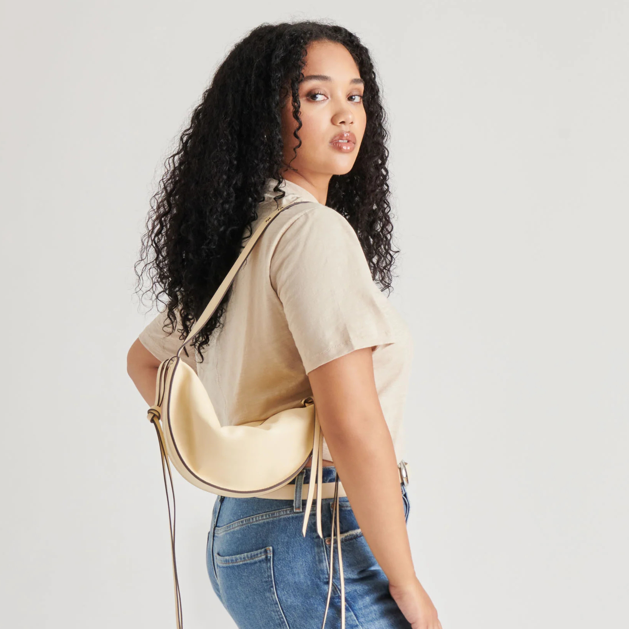 Dolce Vita Verona Shoulder Bag in a stylish design, featuring straps and a spacious interior for everyday use.
