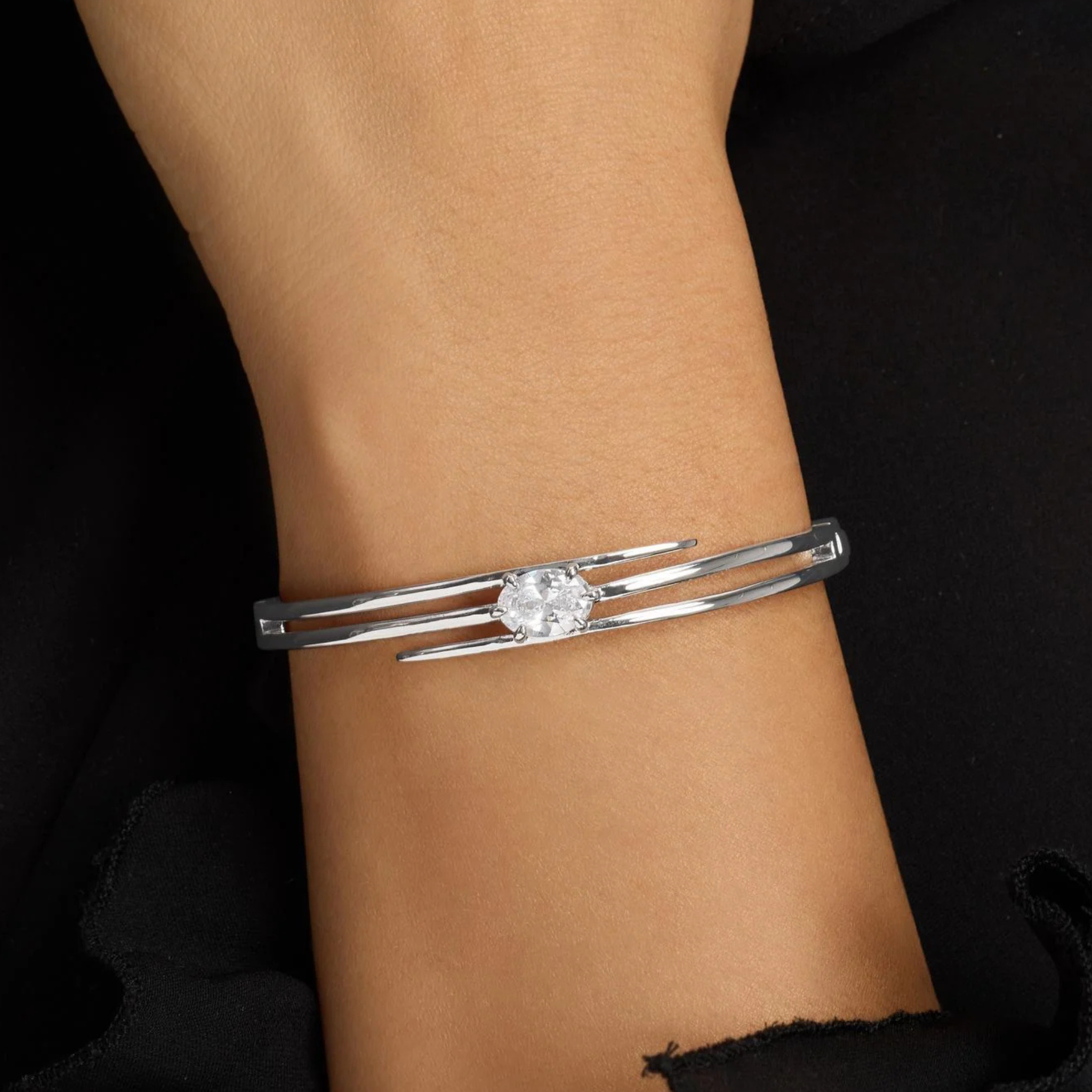 Melinda Maria She's On Point Lasso Cuff bracelet with sleek gold-tone design and minimalist style.