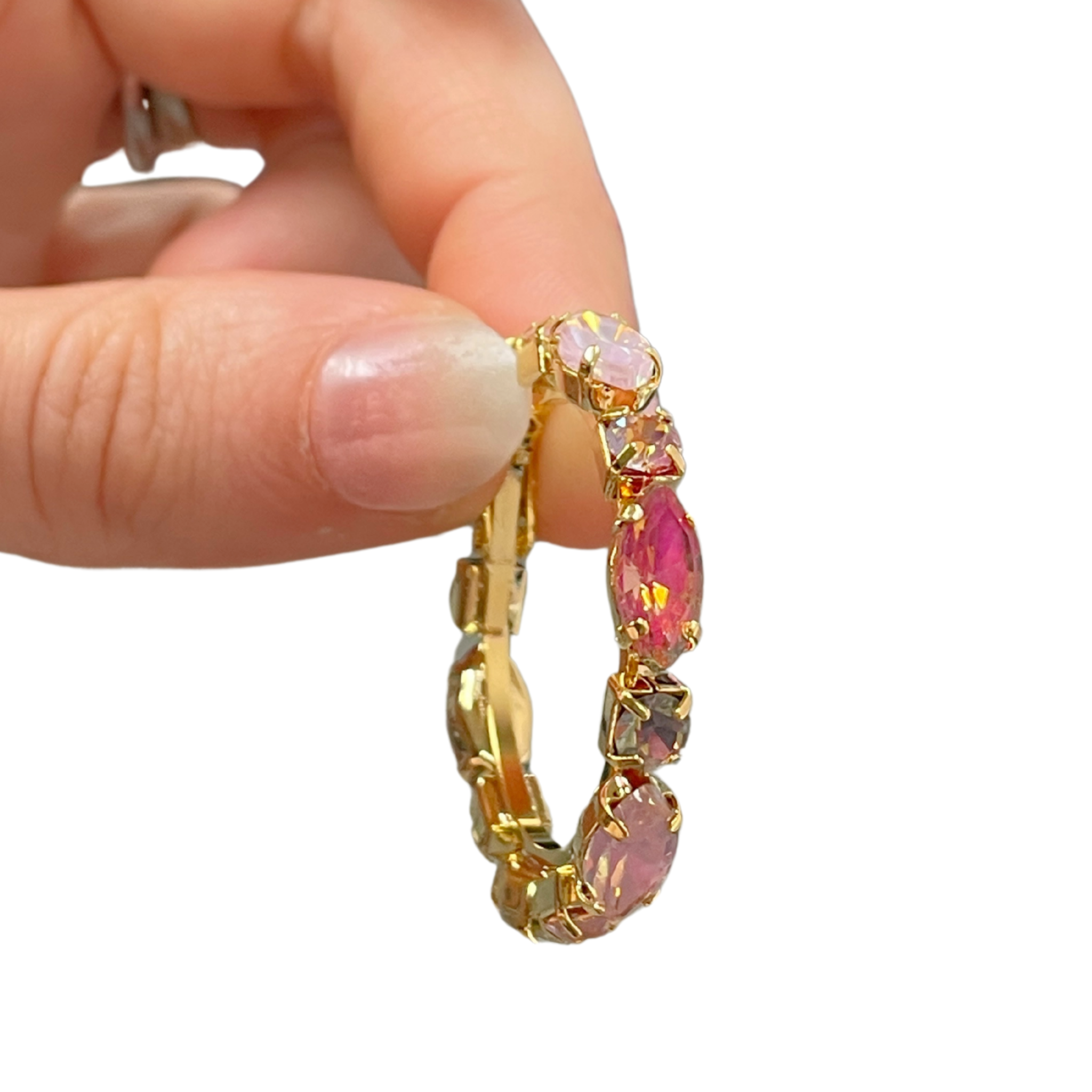 Multicolor cubic zirconia hoops earrings by private label, showcasing vibrant gemstone accents and shiny metal hoops.