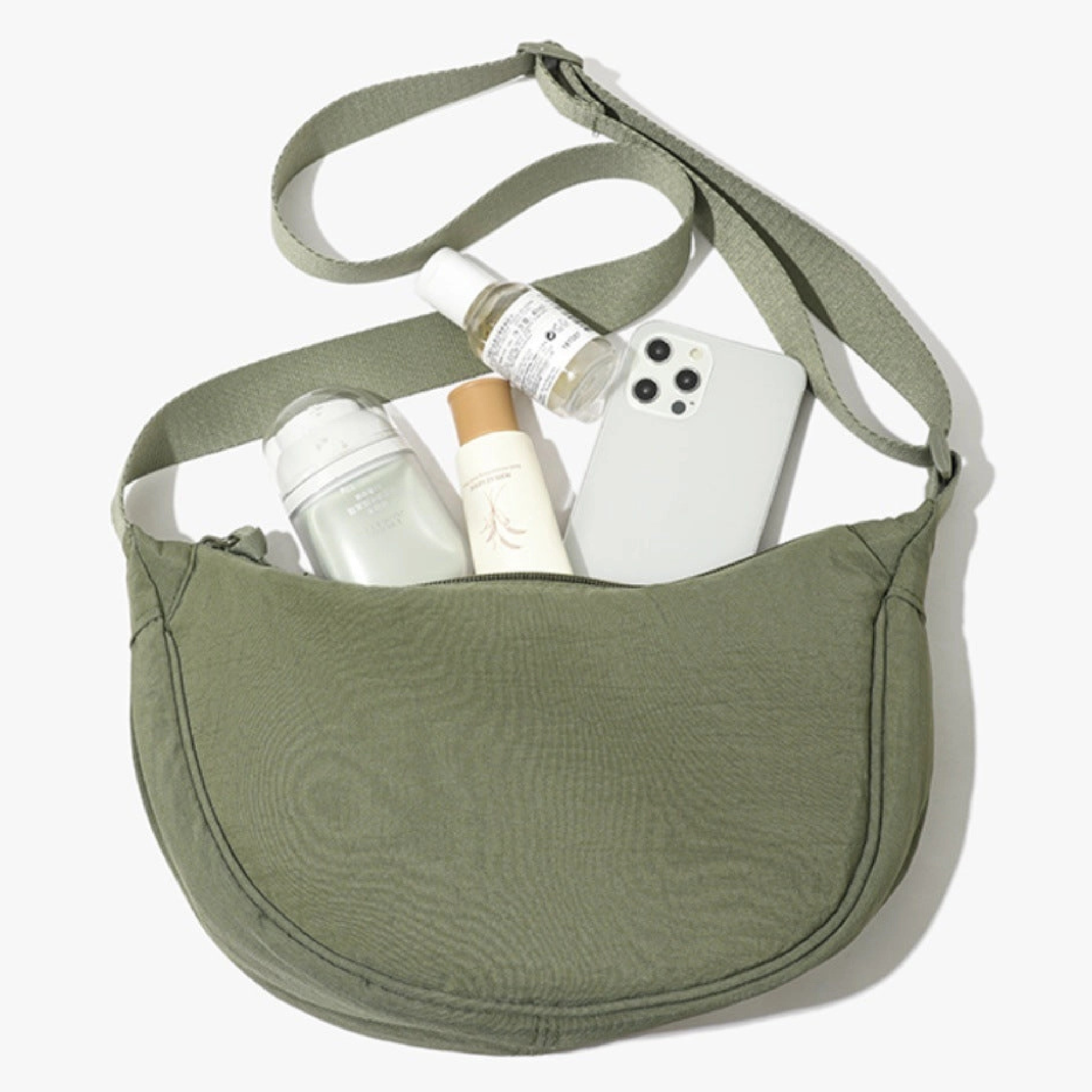 Solid color portable nylon shoulder bag from Private label, stylish handbag with adjustable shoulder strap and spacious interior.