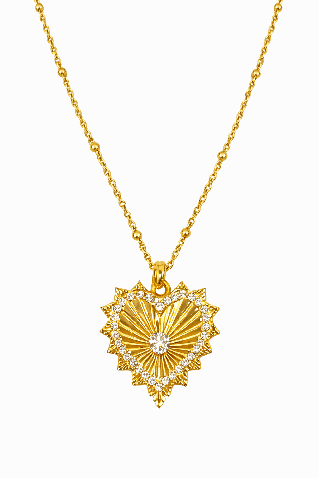 Gold heart necklace from Private Label featuring a radiant heart pendant on a delicate chain.