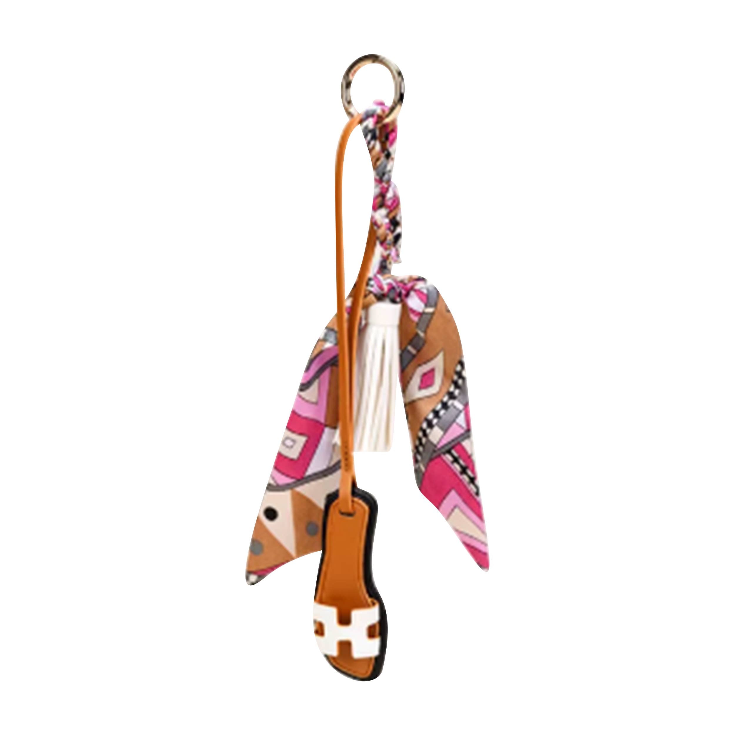 Malibu Sugar sandal with scarf bag charm, featuring colorful fabric and decorative accents on a stylish sandal.