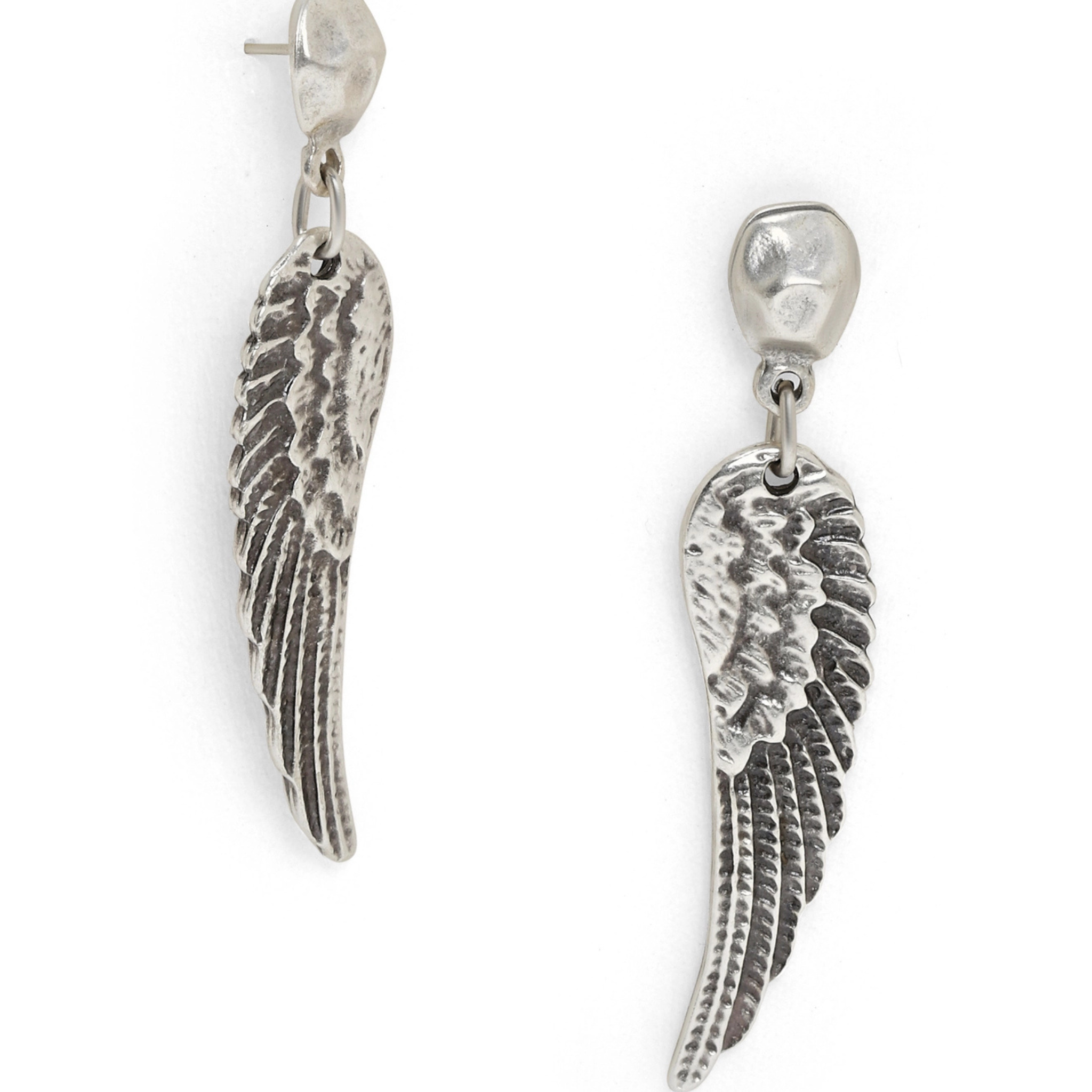 Chanour Seraphina wing earrings featuring delicate silver wings with intricate feather details, hanging from fine hooks.
