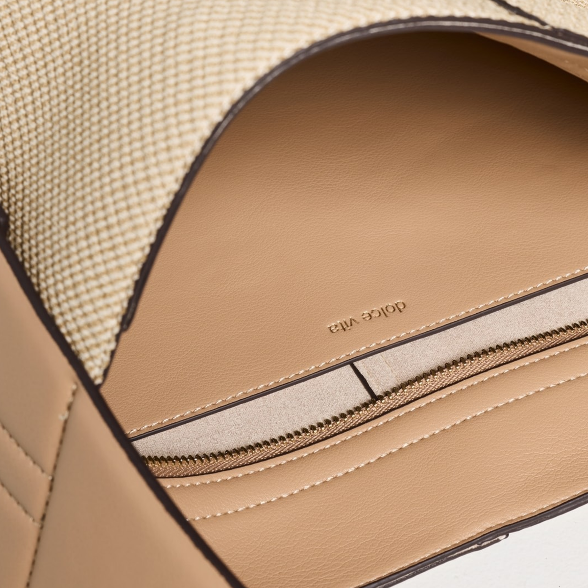 Dolce Vita Annalise mixed media shoulder bag with leather and fabric details, featuring a stylish strap and spacious interior.
