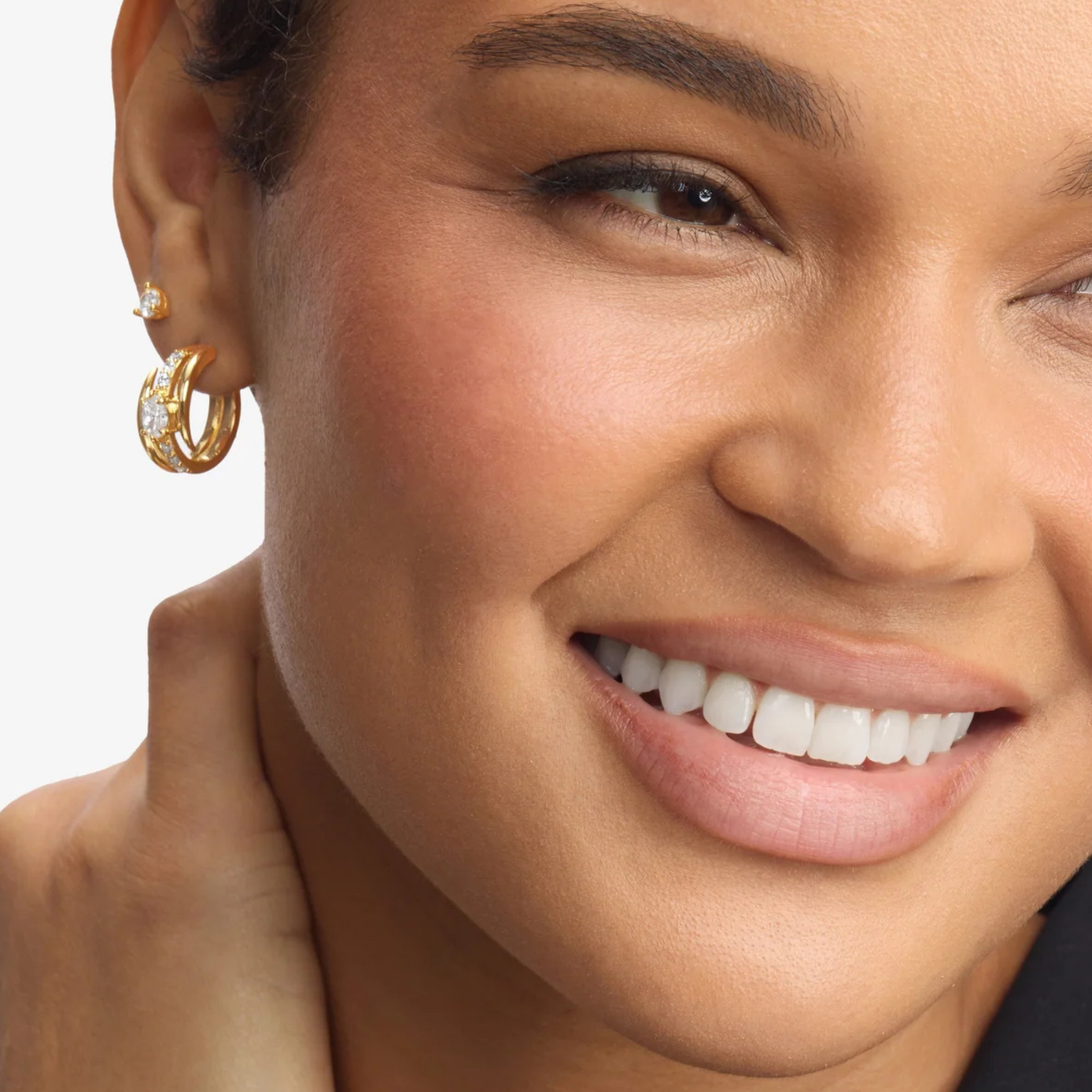 Melinda Maria She's on Point Pavé Lasso Huggies earrings with sparkling pavé stones and a unique lasso design.