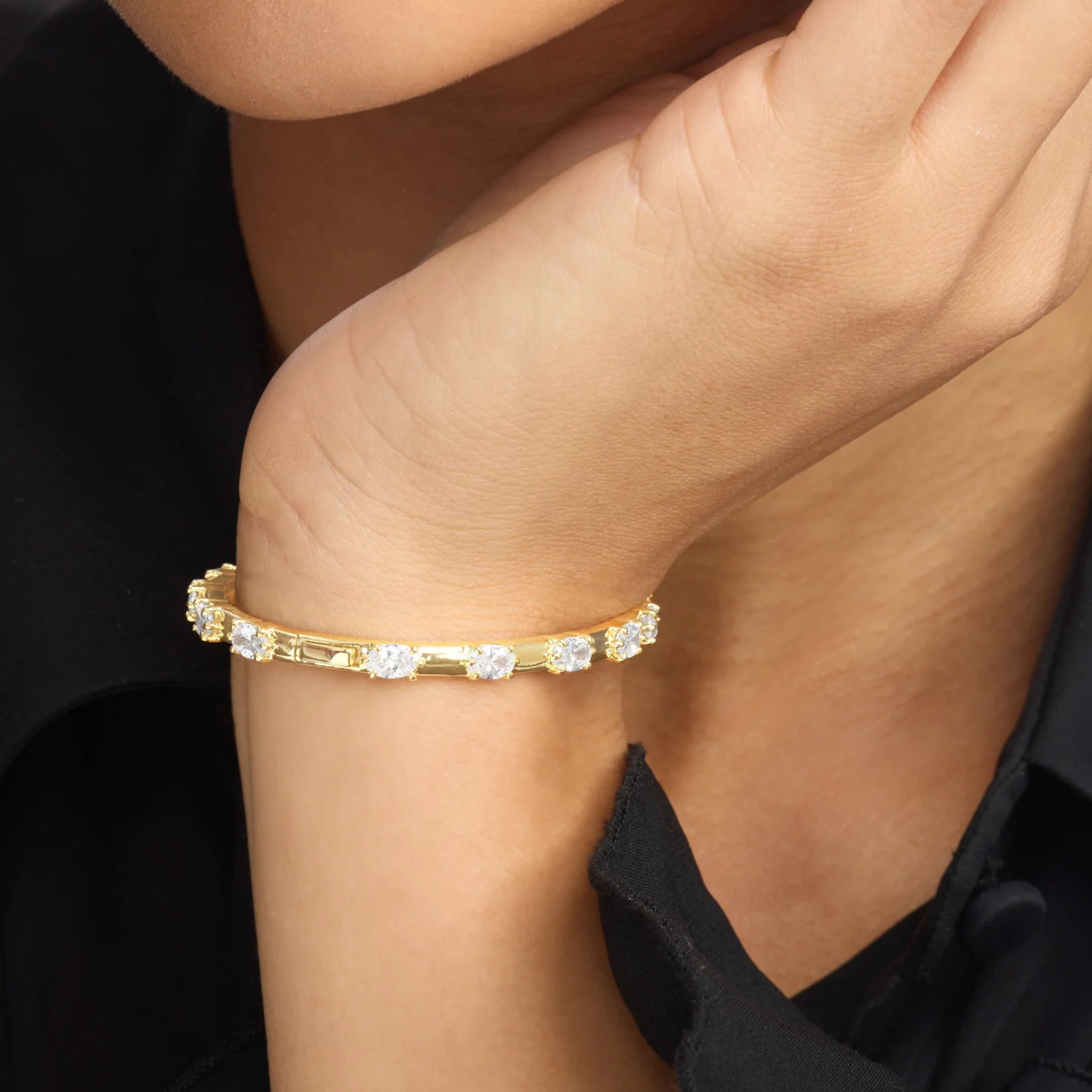 Melinda Maria She's On Point Station Cuff bracelet featuring sleek silver band with evenly spaced station accents.