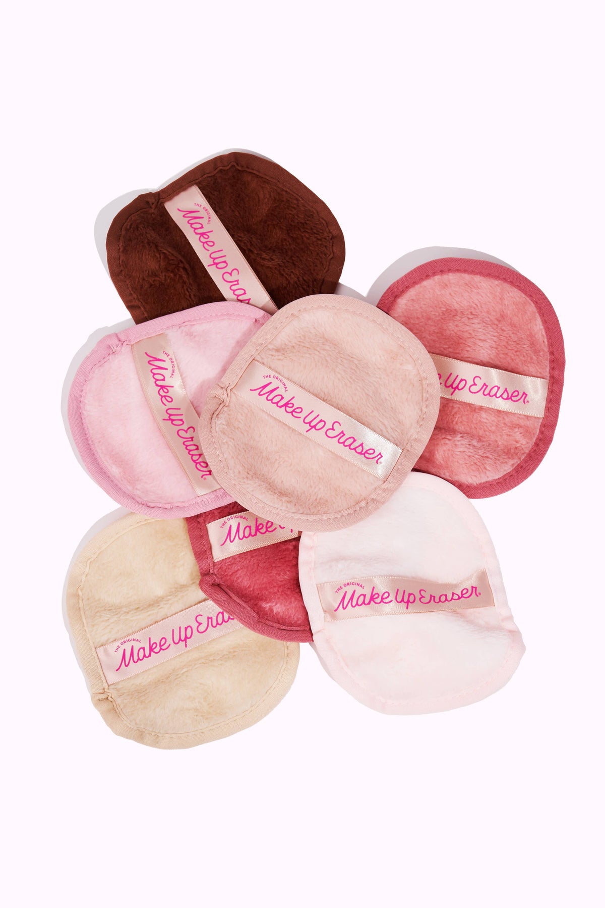 The Original MakeUp Eraser Sweet Cheeks 7-Day Set with blush pink and neutral skincare cloths for makeup removal and skincare.