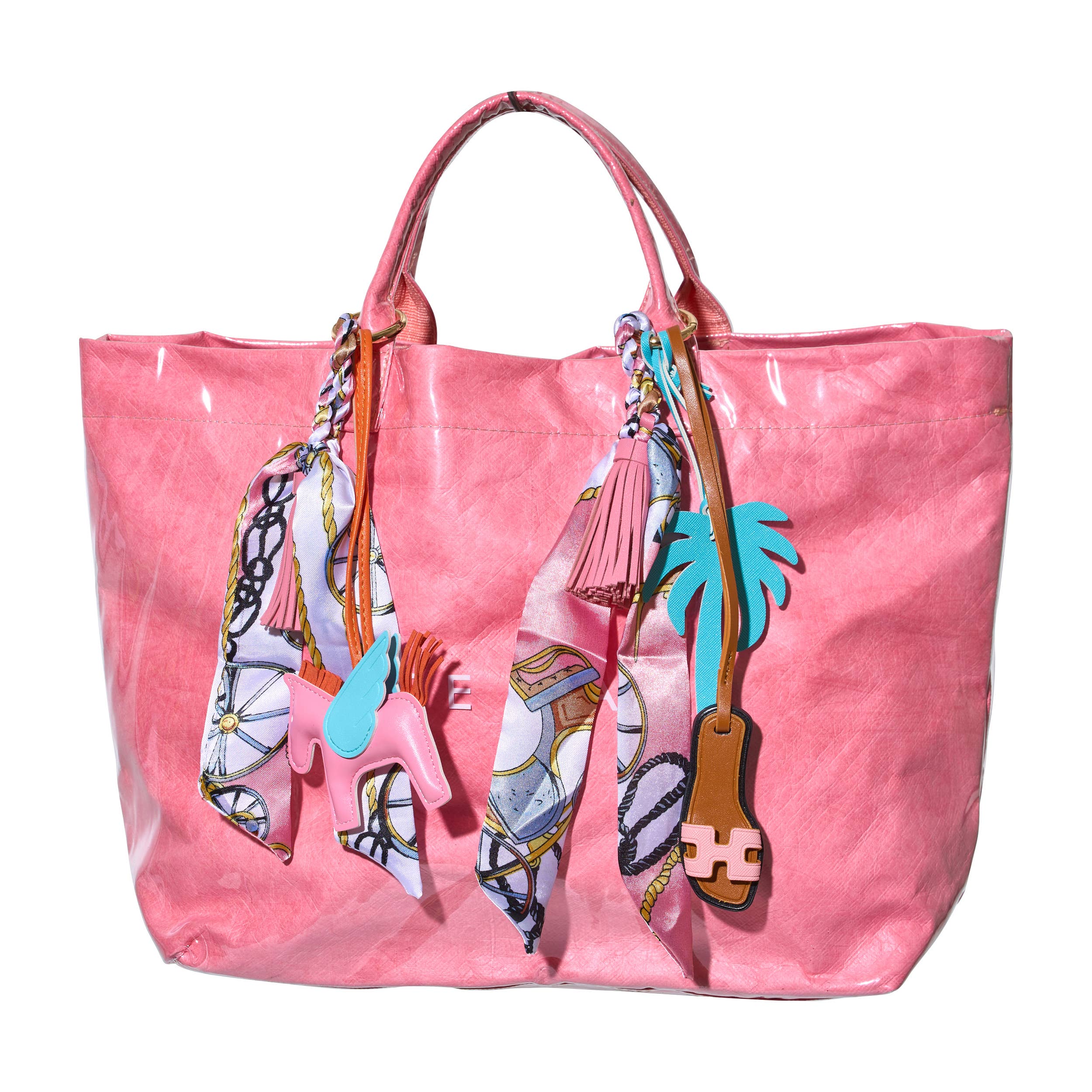 Malibu Sugar sandal with scarf bag charm featuring colorful fabric and decorative accents, showcasing boho-inspired style.