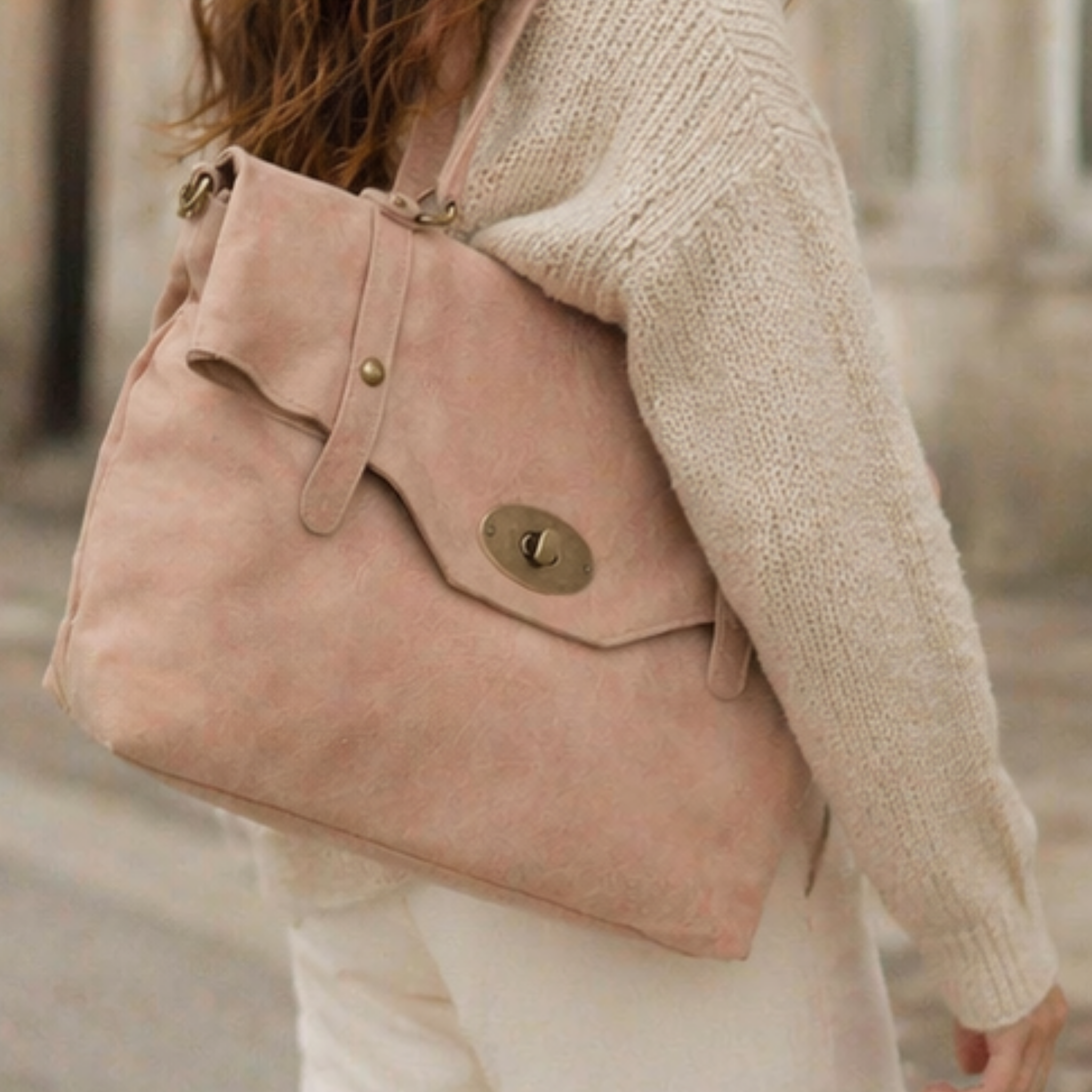 Private label Leonardo Ele crossbody bag with adjustable strap, featuring a sleek leather design and subtle branding.