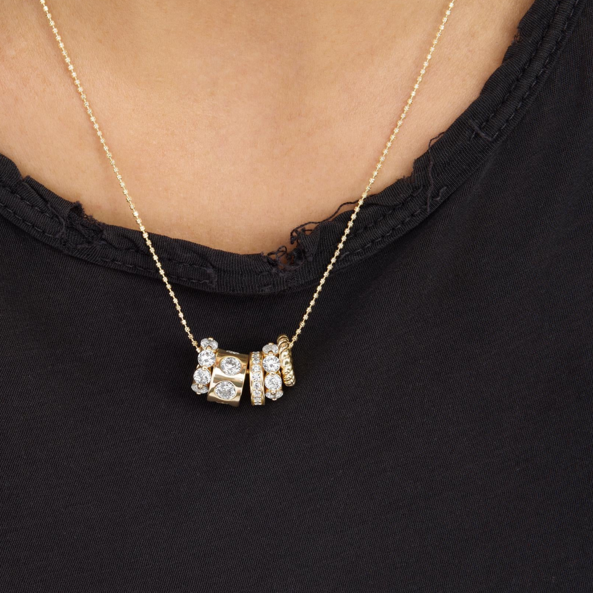 Gold Ashley Venice necklace with white diamondette accents by Melinda Maria, featuring a delicate chain and elegant pendant.