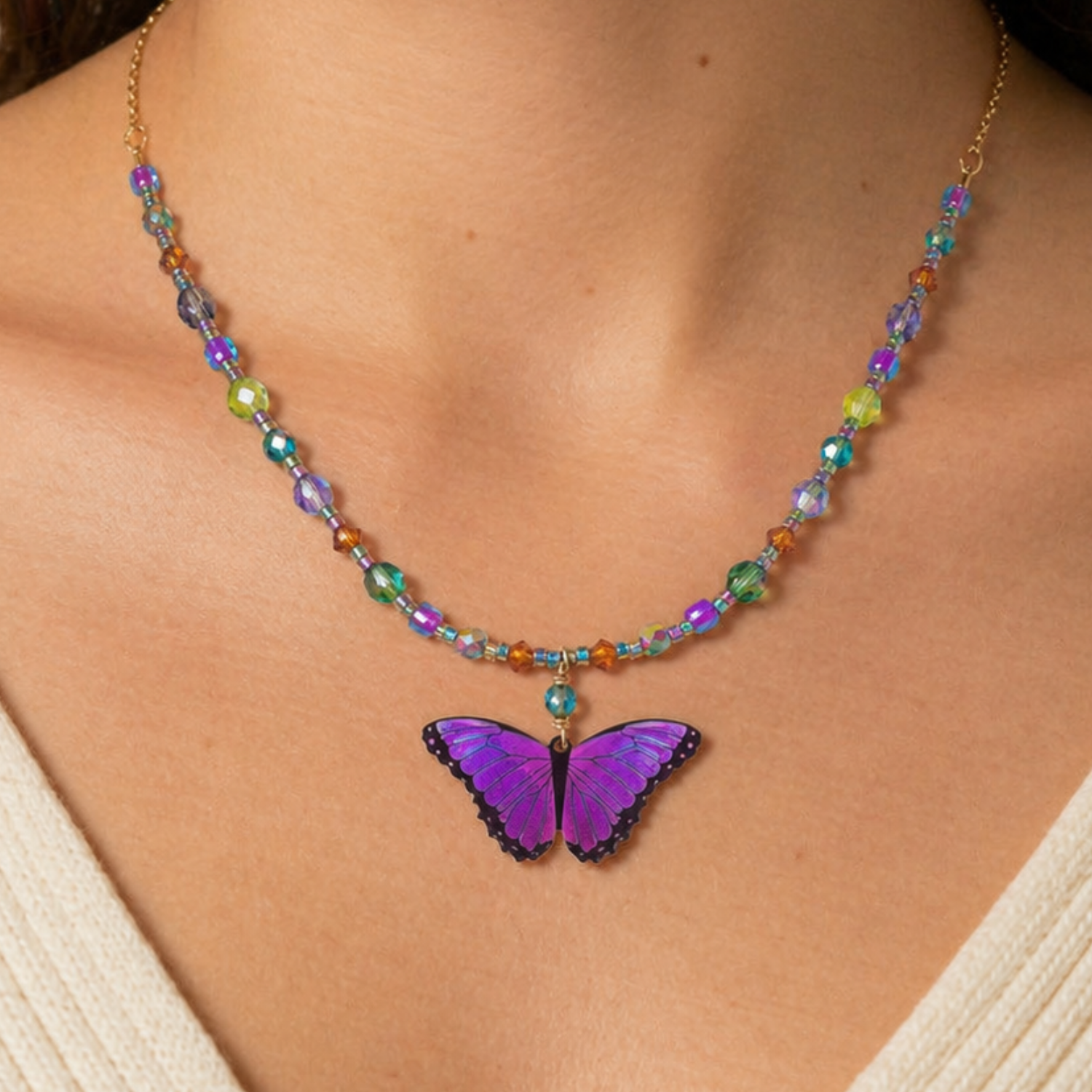 Holly Yashi Bella Butterfly beaded necklace featuring colorful beads and delicate butterfly pendant on a silver chain.