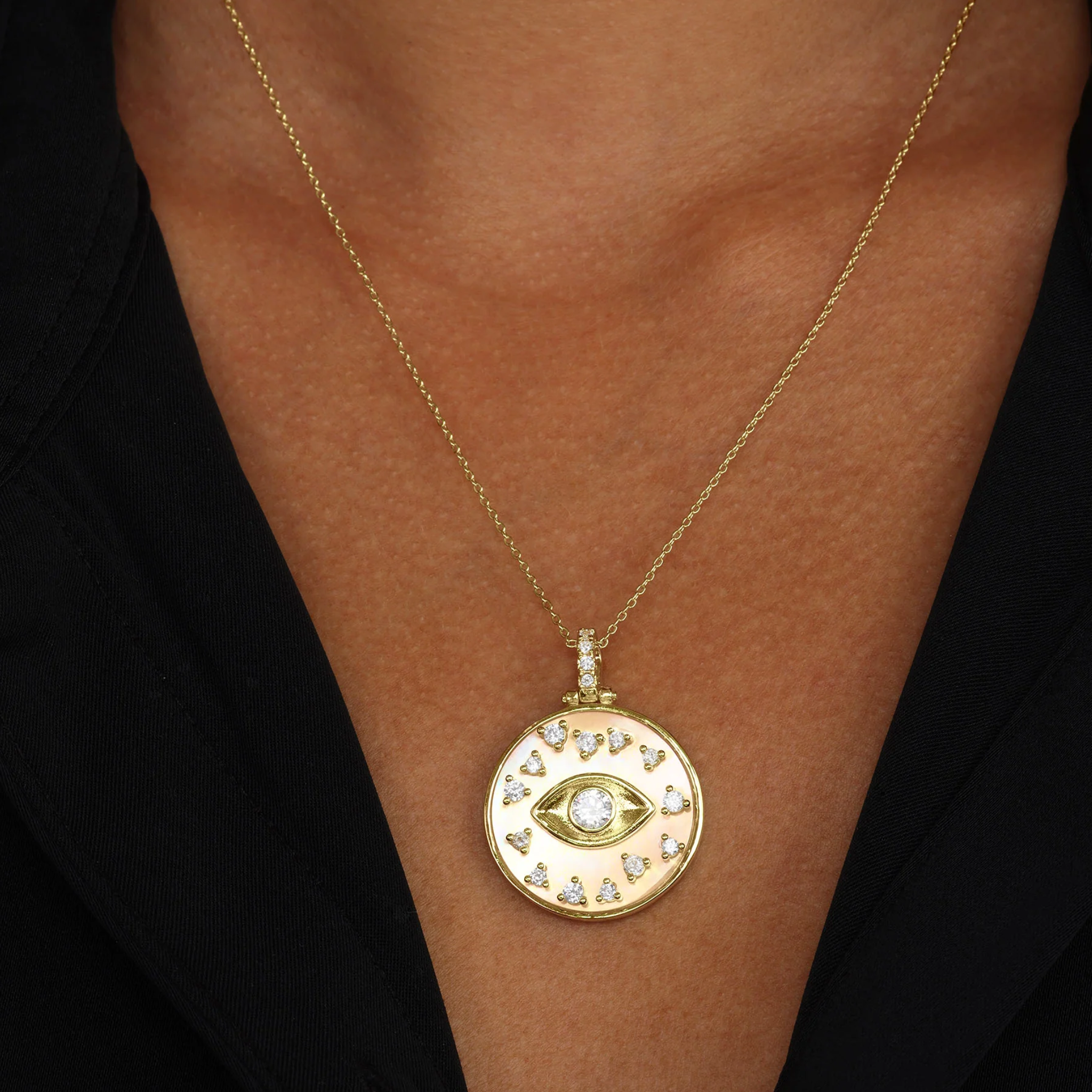 Gold Evil Eye Medallion Necklace by Melinda Maria featuring white diamondettes in a delicate design.