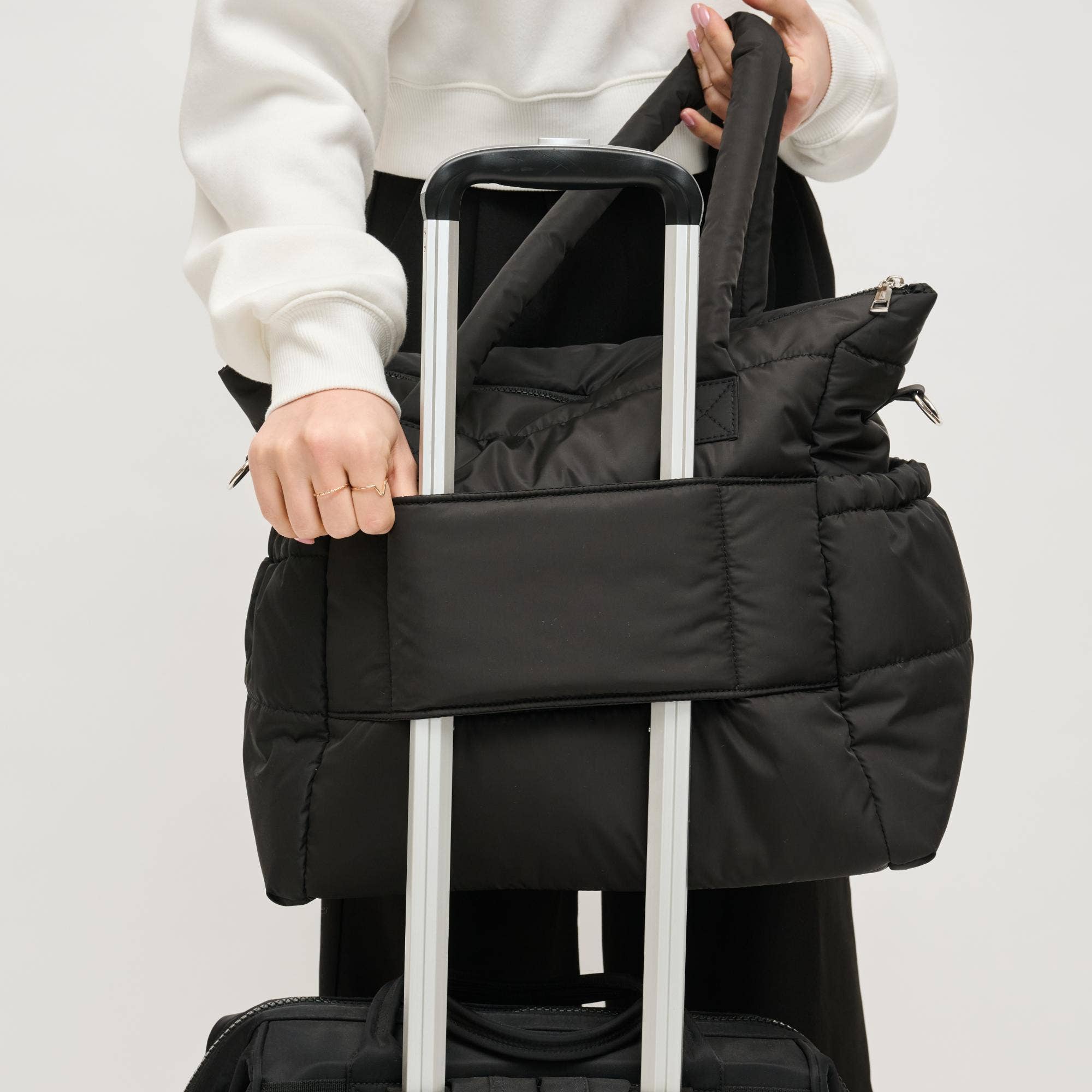Urban Expressions Jetsetter Multi Compartment Travel Tote in stylish design with multiple pockets for organized travel.
