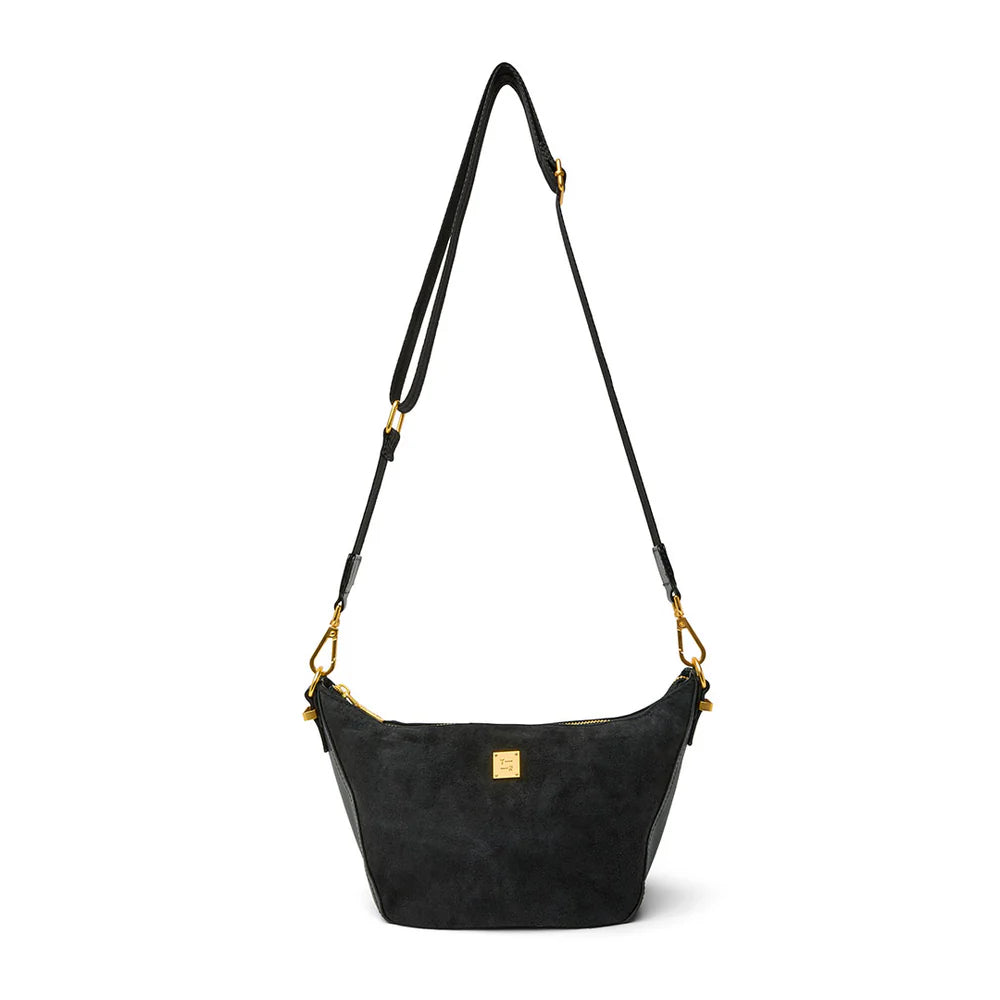 Think Royln Moonbeam bag with sleek design, featuring a compact shape and stylish handle for versatile everyday use.