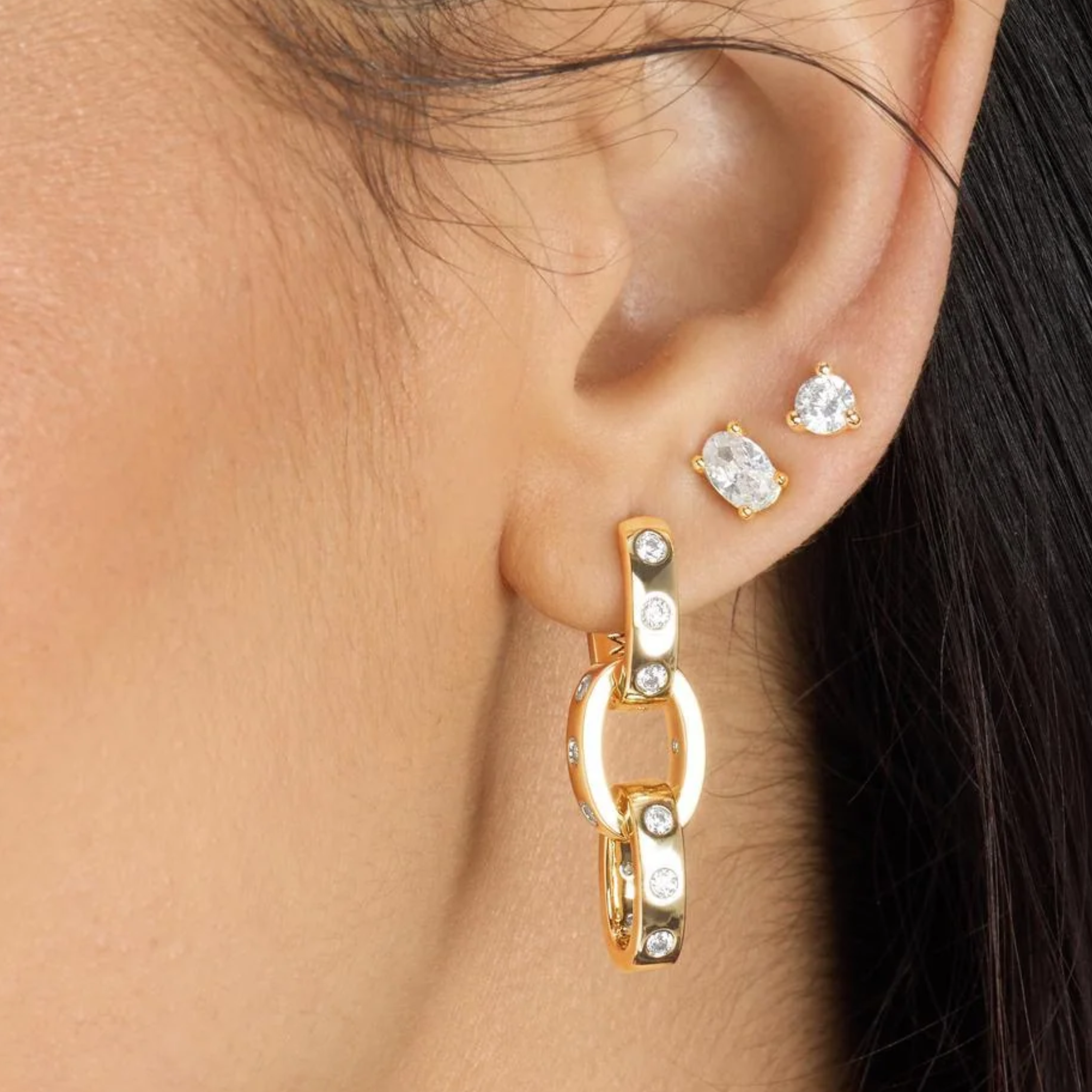 Melinda Maria Ashley Chain Convertible Earrings featuring gold-tone chain design and versatile style for pierced ears.