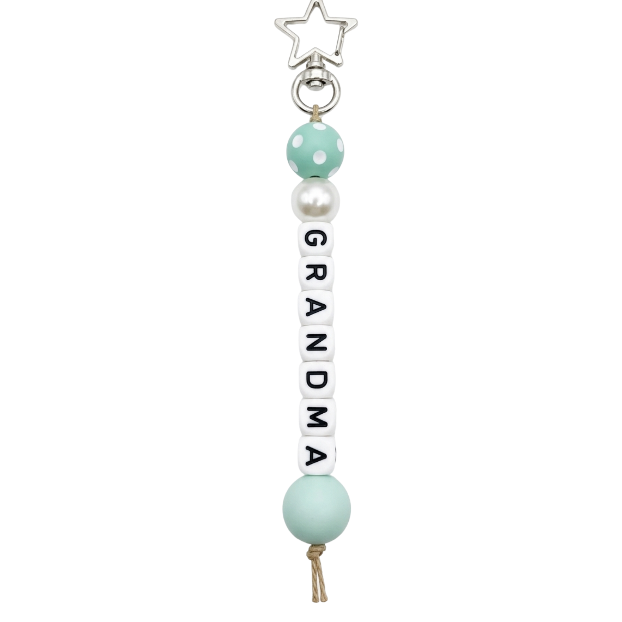 Jules by the Sea bag charms and keychains with colorful sea-themed designs and hanging decorative elements.