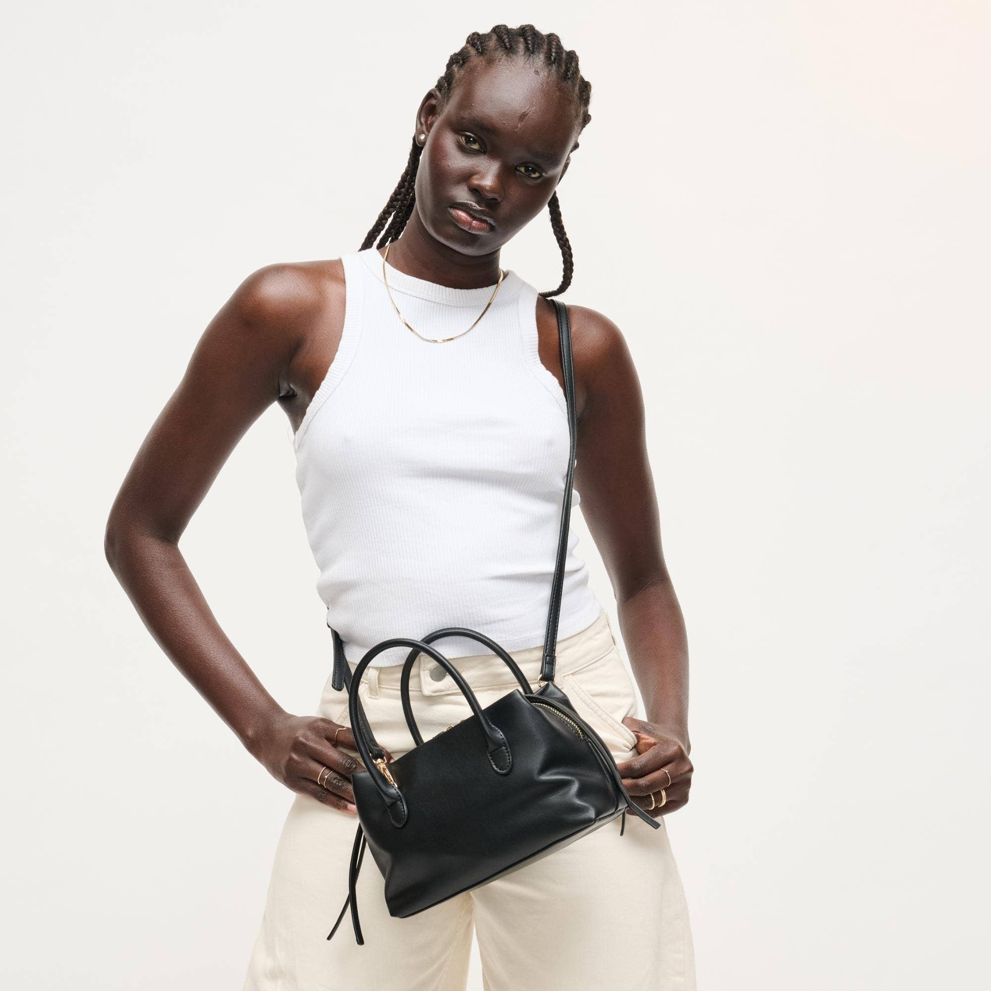 Urban Expressions Logan Crossbody bag with adjustable strap and stylish design, perfect for everyday accessories.