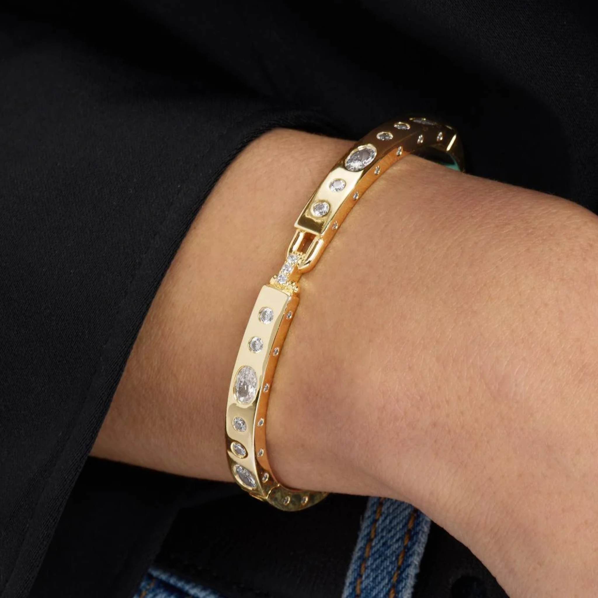 Gold Ashley Sunset Lock Cuff 6mm bracelet with white diamondette accents by Melinda Maria, featuring a sleek, modern design.