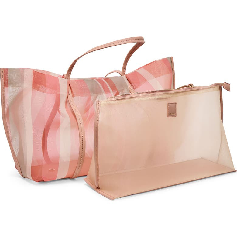 Dolce Vita Aislin Coral Stripe Mesh Tote beach bag with breathable mesh fabric and vibrant coral and white striped design.