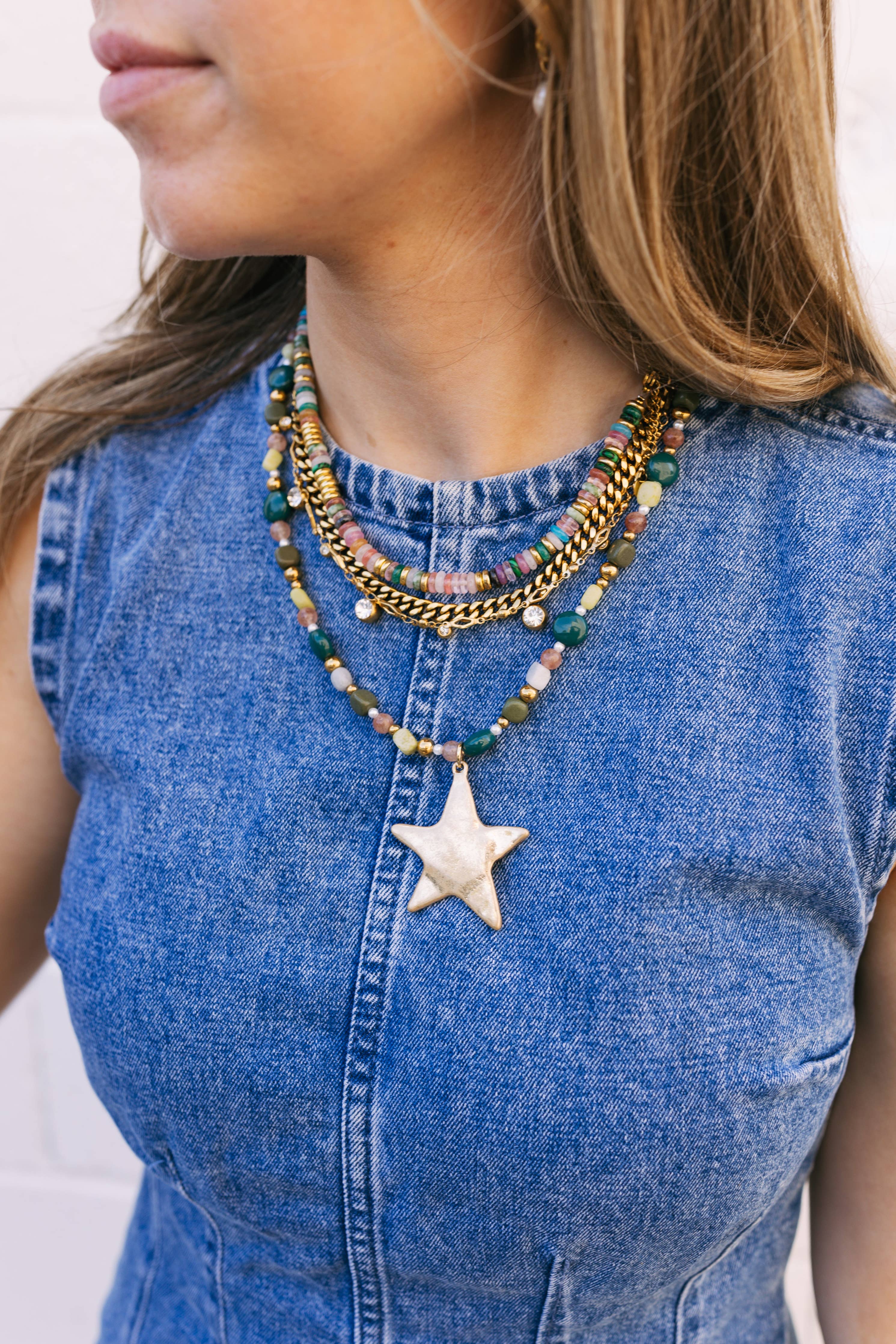 Layered green Ziggy Star necklace by BELJOY, featuring delicate chains and star-shaped pendants.