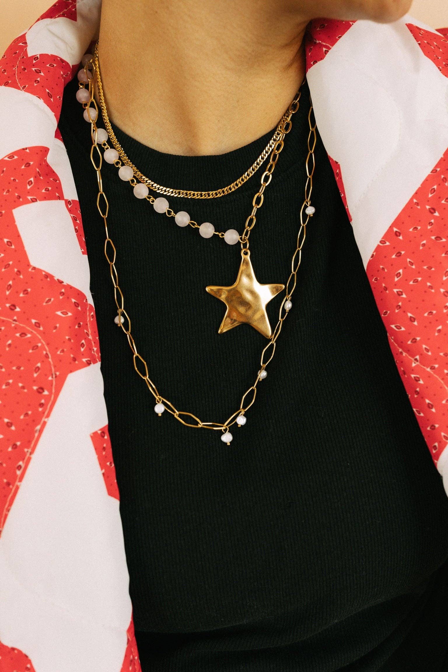 Starry Beaded Chain Necklace by BELJOY featuring a delicate chain with shimmering beads and elegant design.