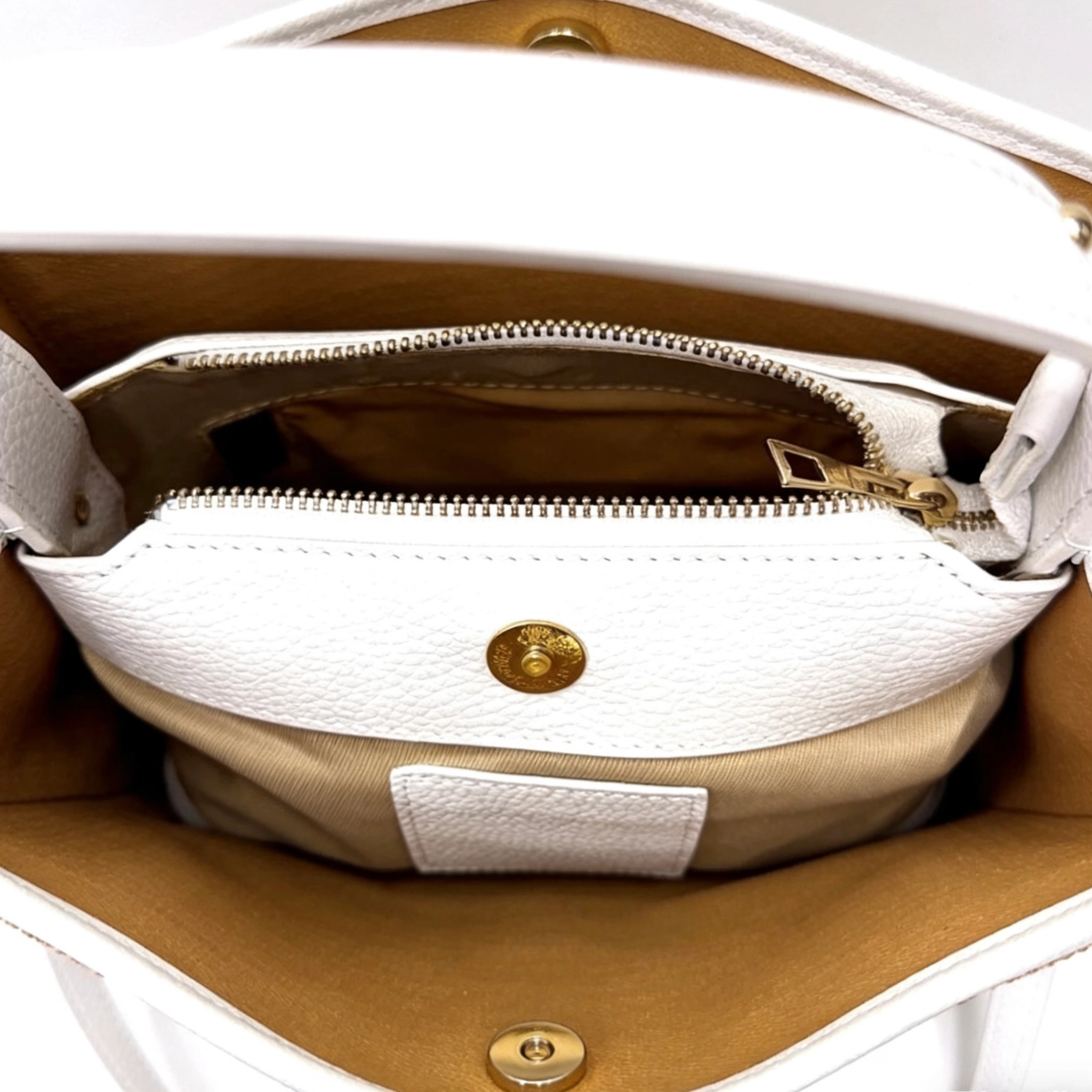 Private label raffia handbag with genuine leather details, showcasing woven texture and stylish design.