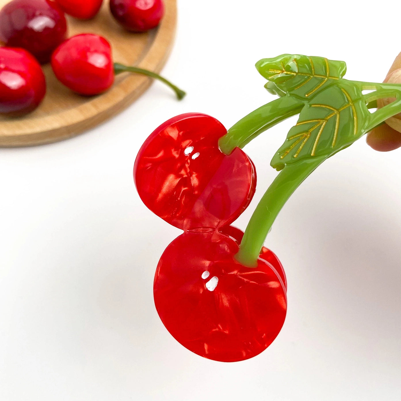 Sweet Red Cherry Claw Clip by Private Label featuring twin cherry design, ideal for securing hair with a playful, colorful accessory.