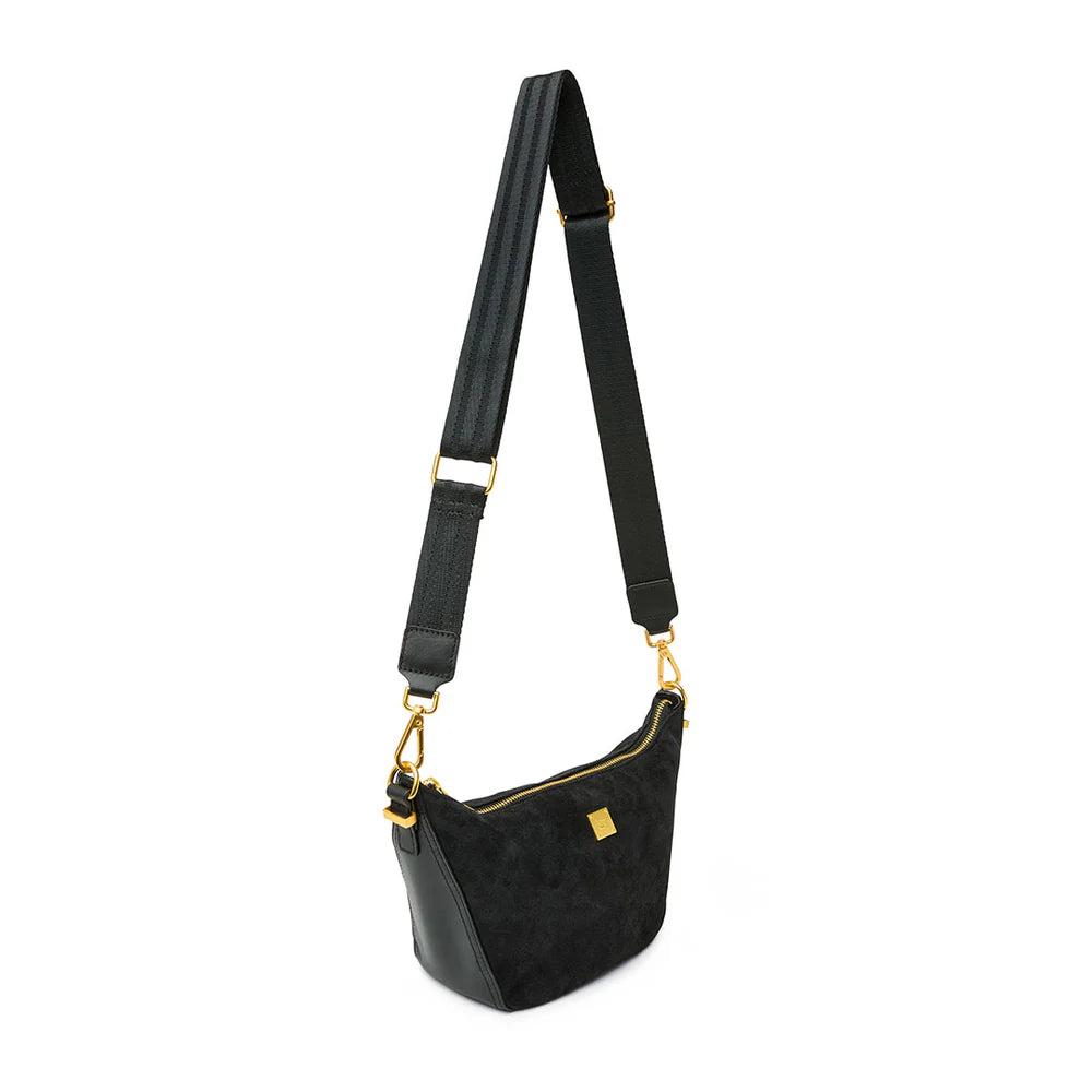 Think Royln Moonbeam bag featuring a sleek, modern design with a smooth surface and stylish straps.