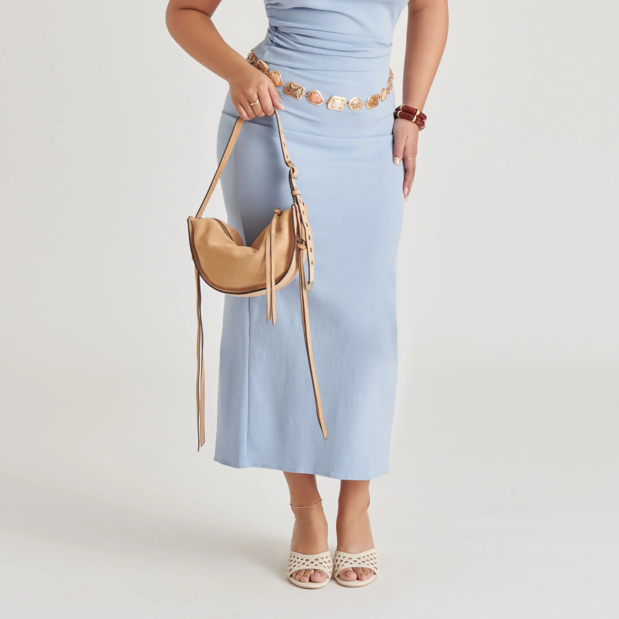 Dolce Vita Verona Shoulder Bag featuring a stylish design and adjustable strap, perfect for everyday use.