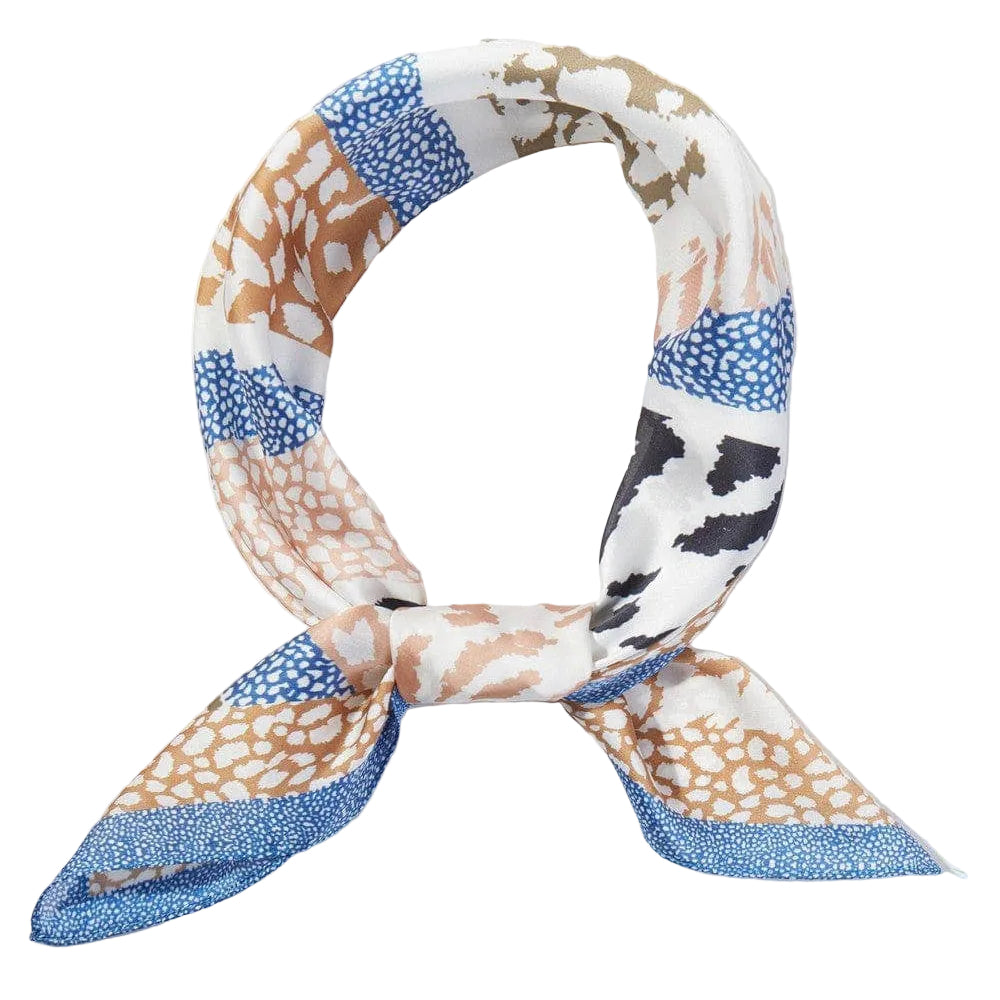 Abstract leopard print scarf with bold pattern, made by Private Label, featuring stylish and versatile fashion accessory.