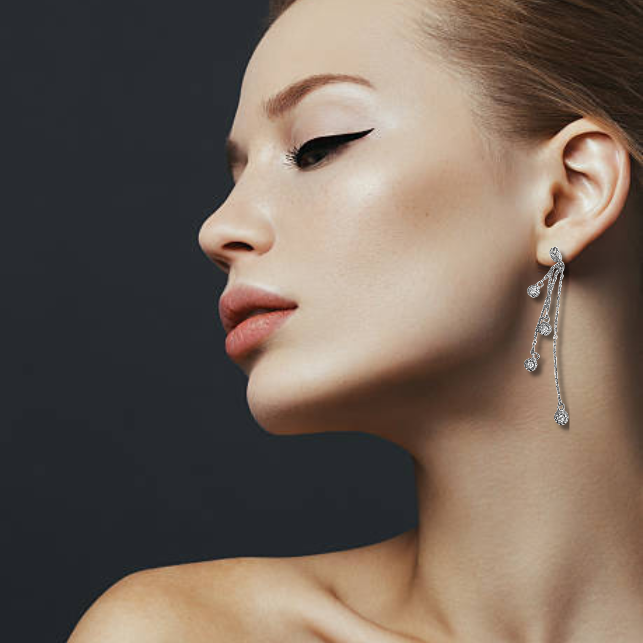 Private label droplet earrings featuring sparkling Austrian Swarovski crystals, elegant jewelry accessory with a classic design.