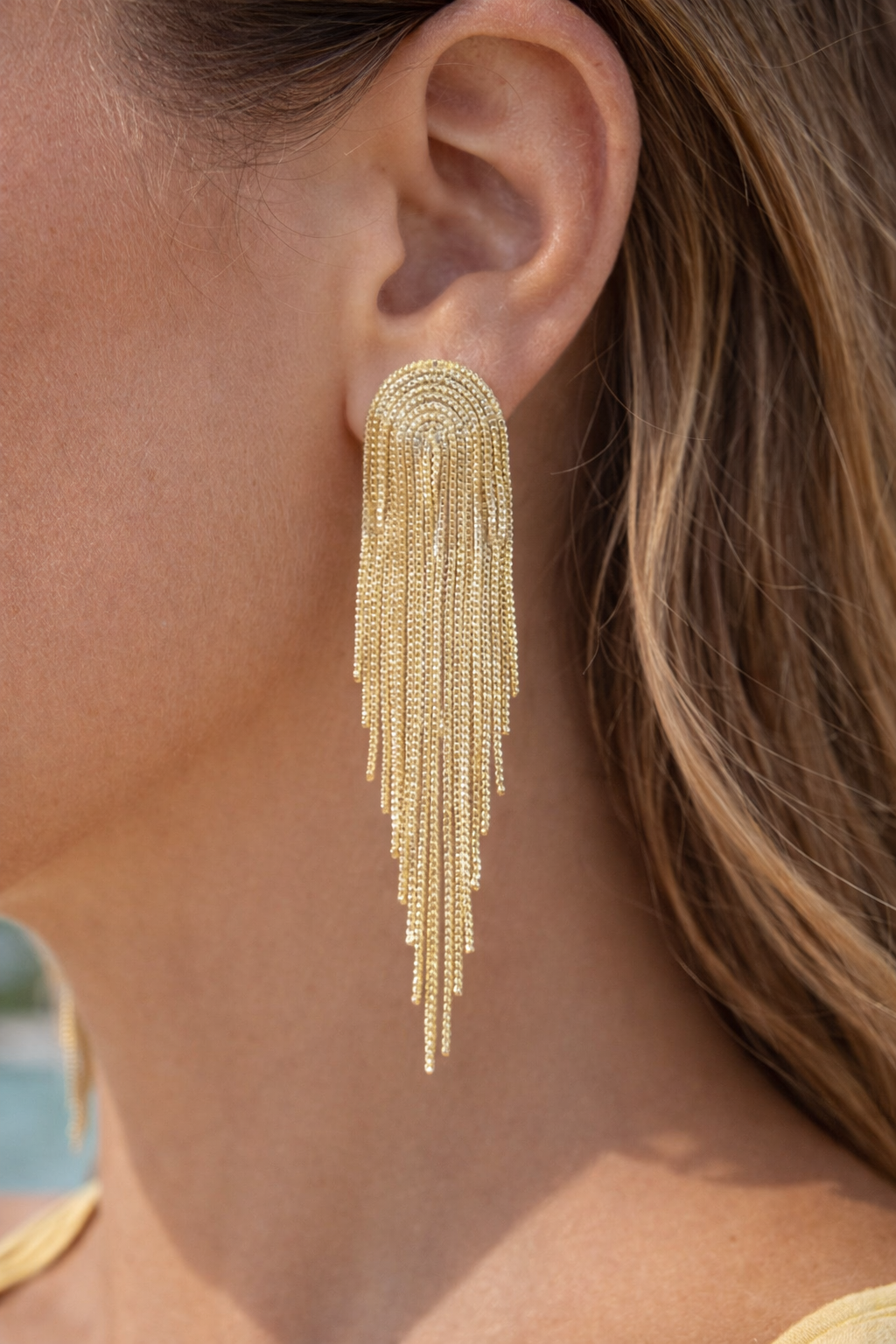 Gemelli shimmer earrings featuring a delicate design with sparkling accents, perfect for adding elegance to any outfit.