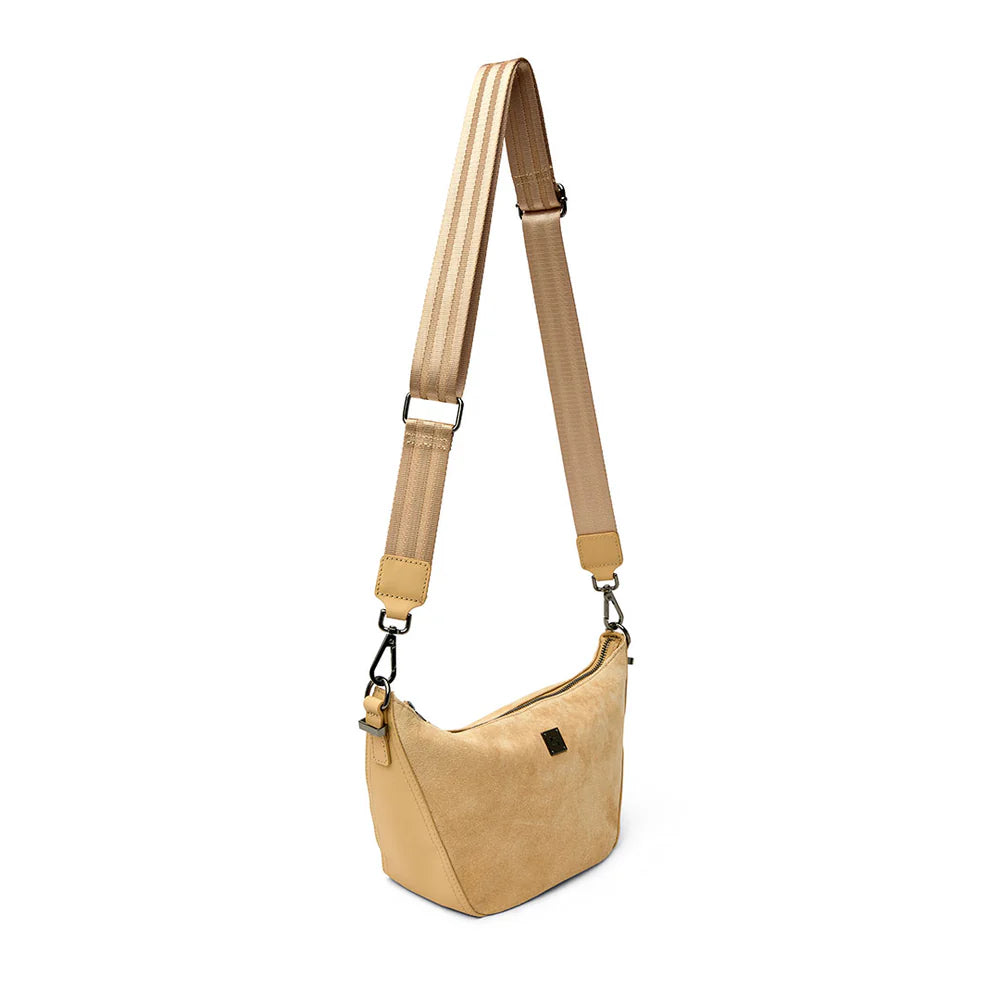 Think Royln Moonbeam bag with sleek design, featuring a modern, stylish look and smooth material, shown in a close-up view.
