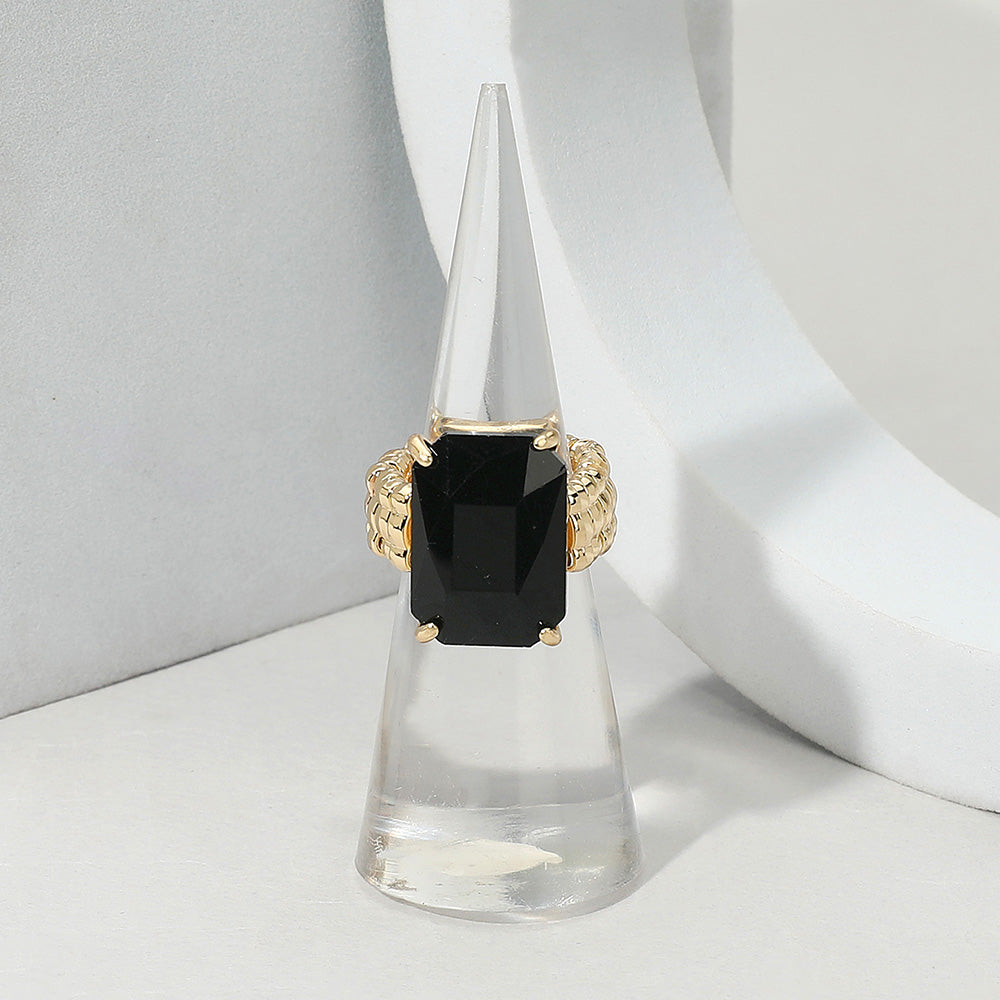 Faceted emerald cut stone cluster stretch ring by Private Label Jewelry, featuring sparkling gemstone accents and a flexible band.