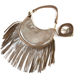 Gold fringe handbag with a strap on a white background