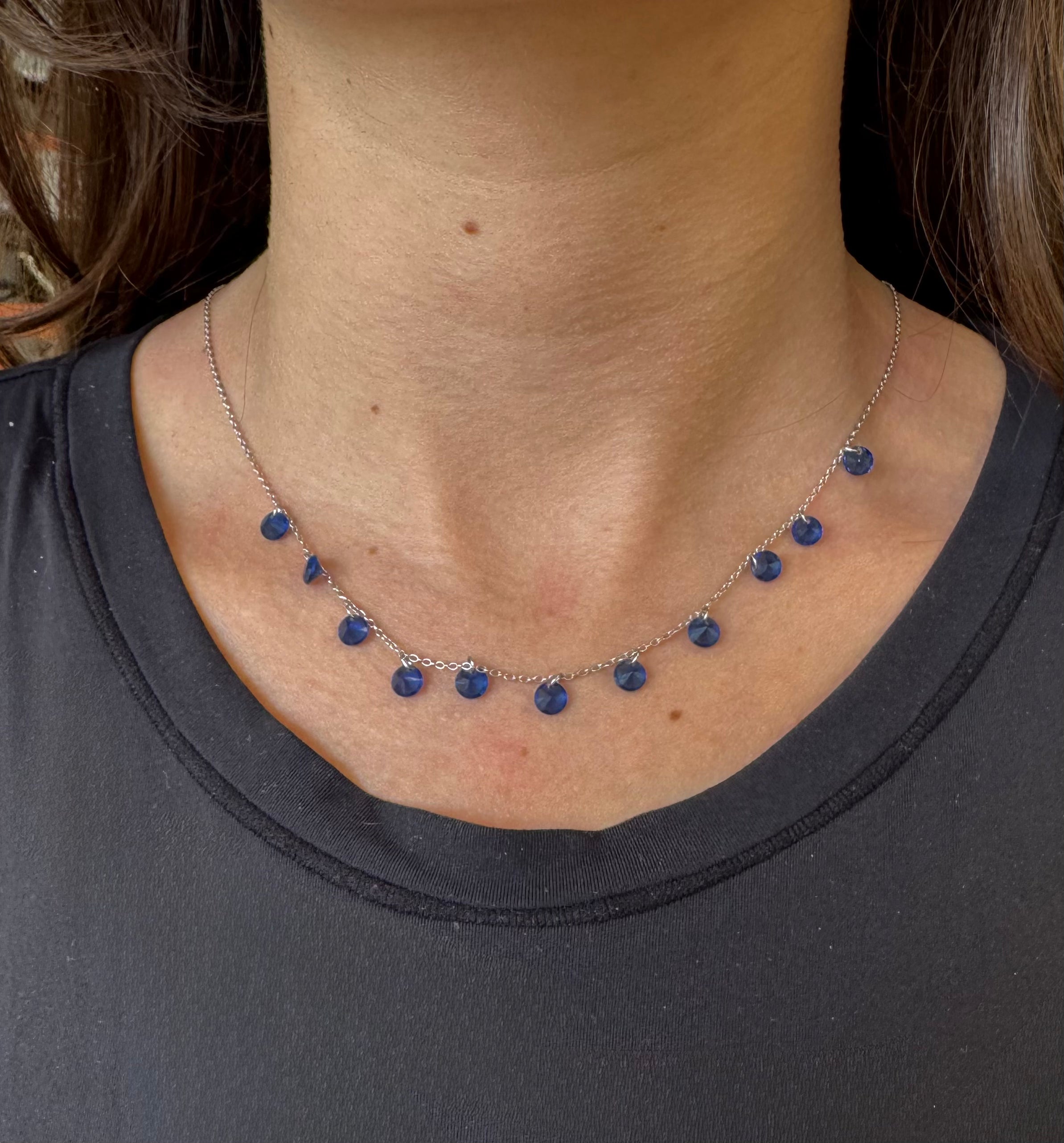 Colorful teardrop necklace by SA featuring vibrant gemstones in an elegant design on a simple chain.