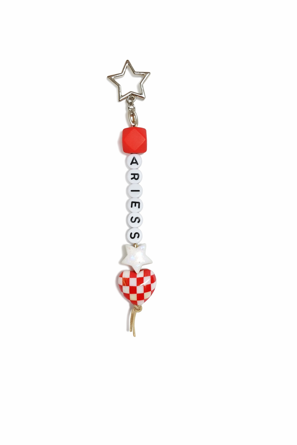 Jules by the Sea Zodiac keychain featuring a celestial design and metallic finish, attached to a metal keyring.