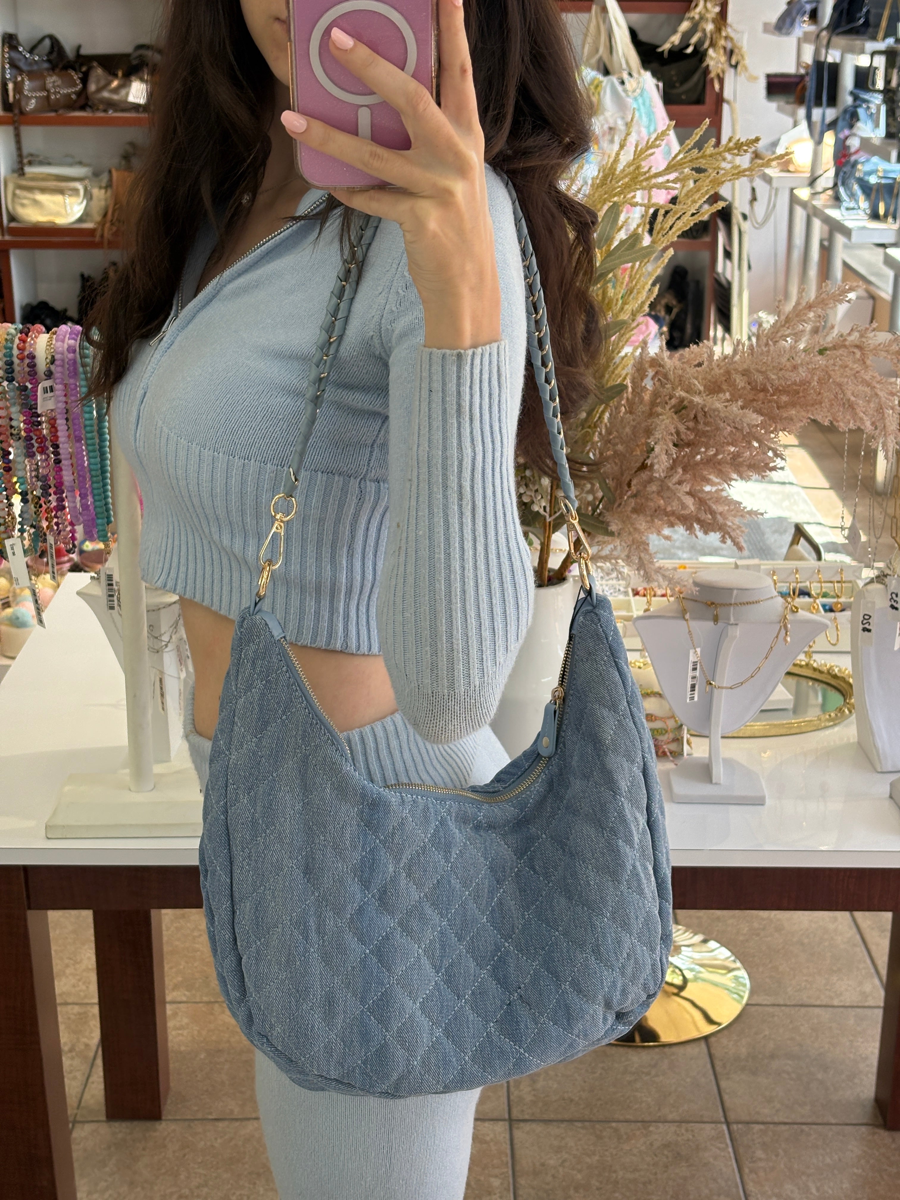 Bc Handbags quilted hobo crossbody bag with adjustable strap and zip closure, featuring a stylish quilted design.