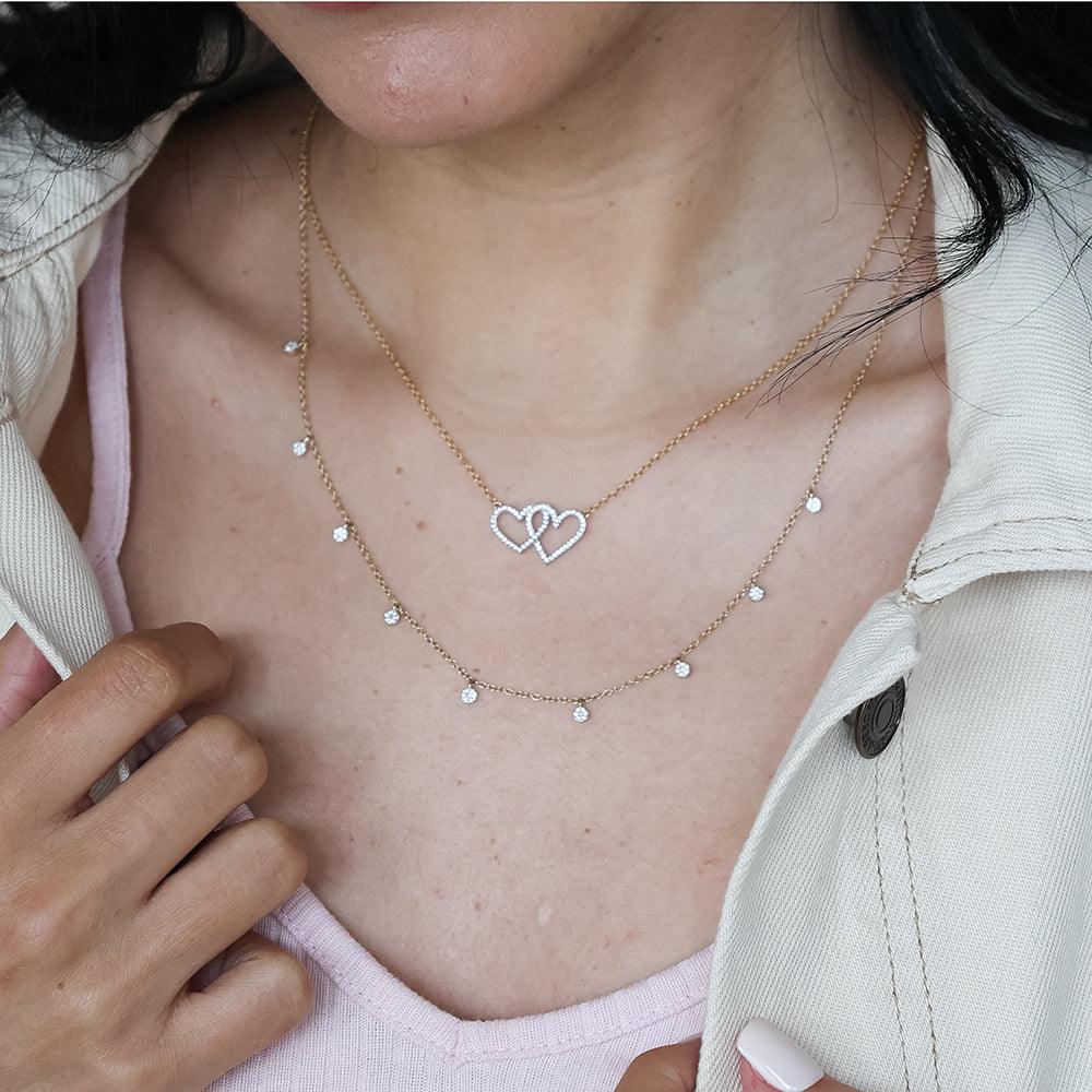 Two hearts pendant necklace