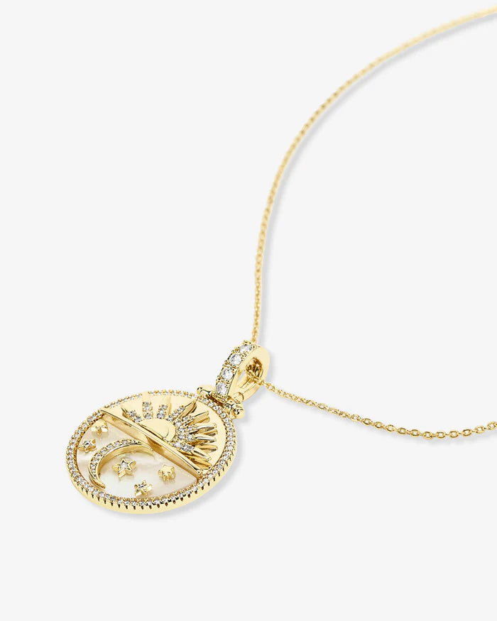 Gold medallion necklace with white diamondette accents by Melinda Maria, showcasing a stylish jewelry piece on a white background.